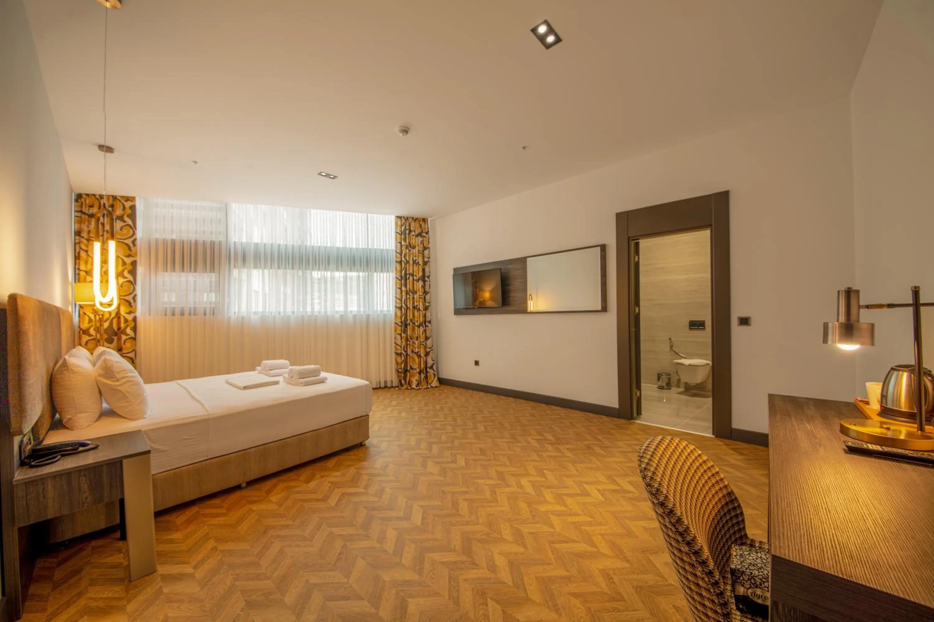 Bed in V Center Hotel