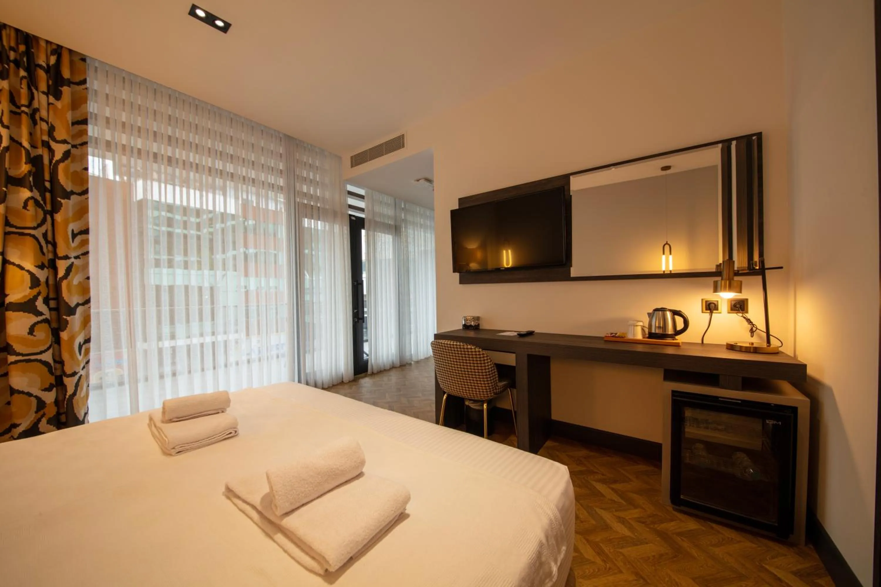 Bed in V Center Hotel