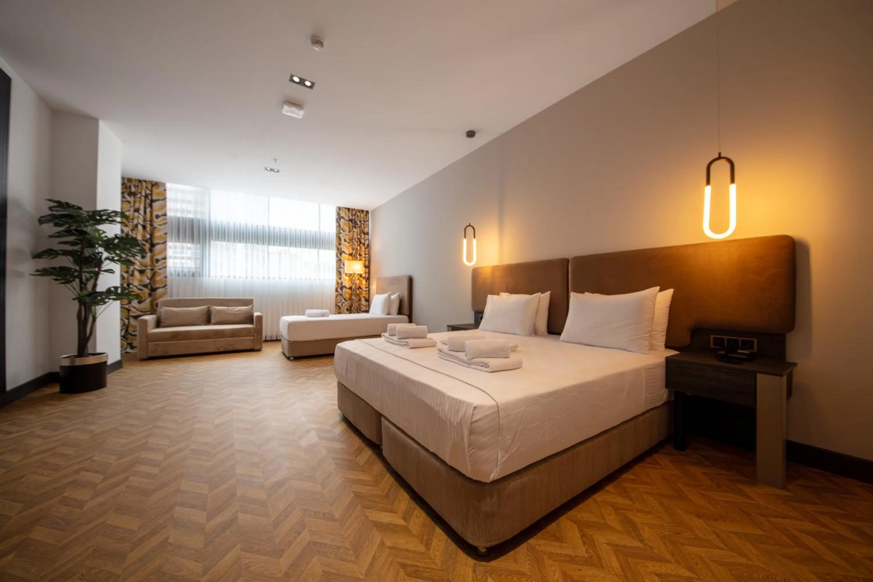 Bed in V Center Hotel