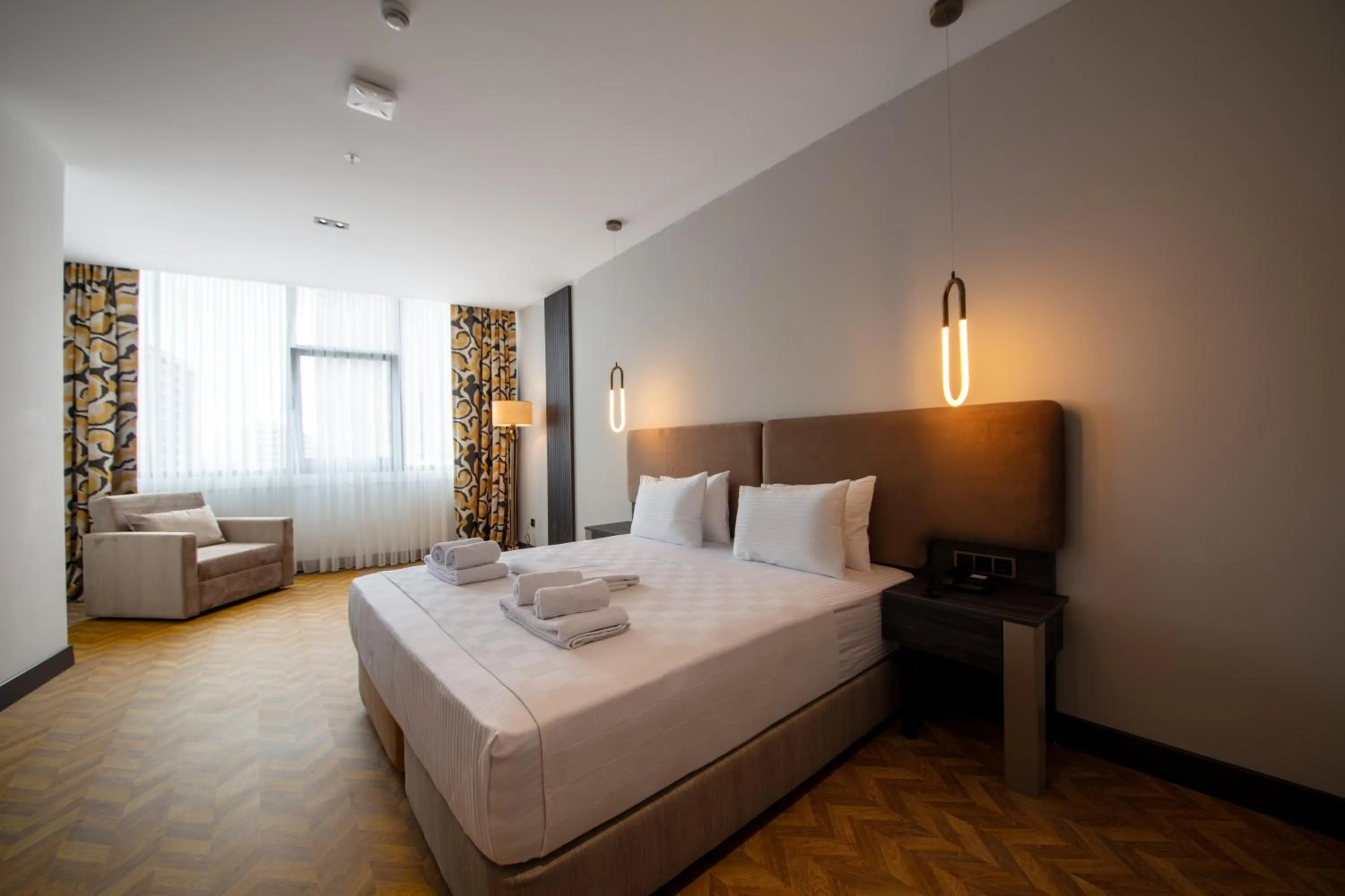 Bed in V Center Hotel