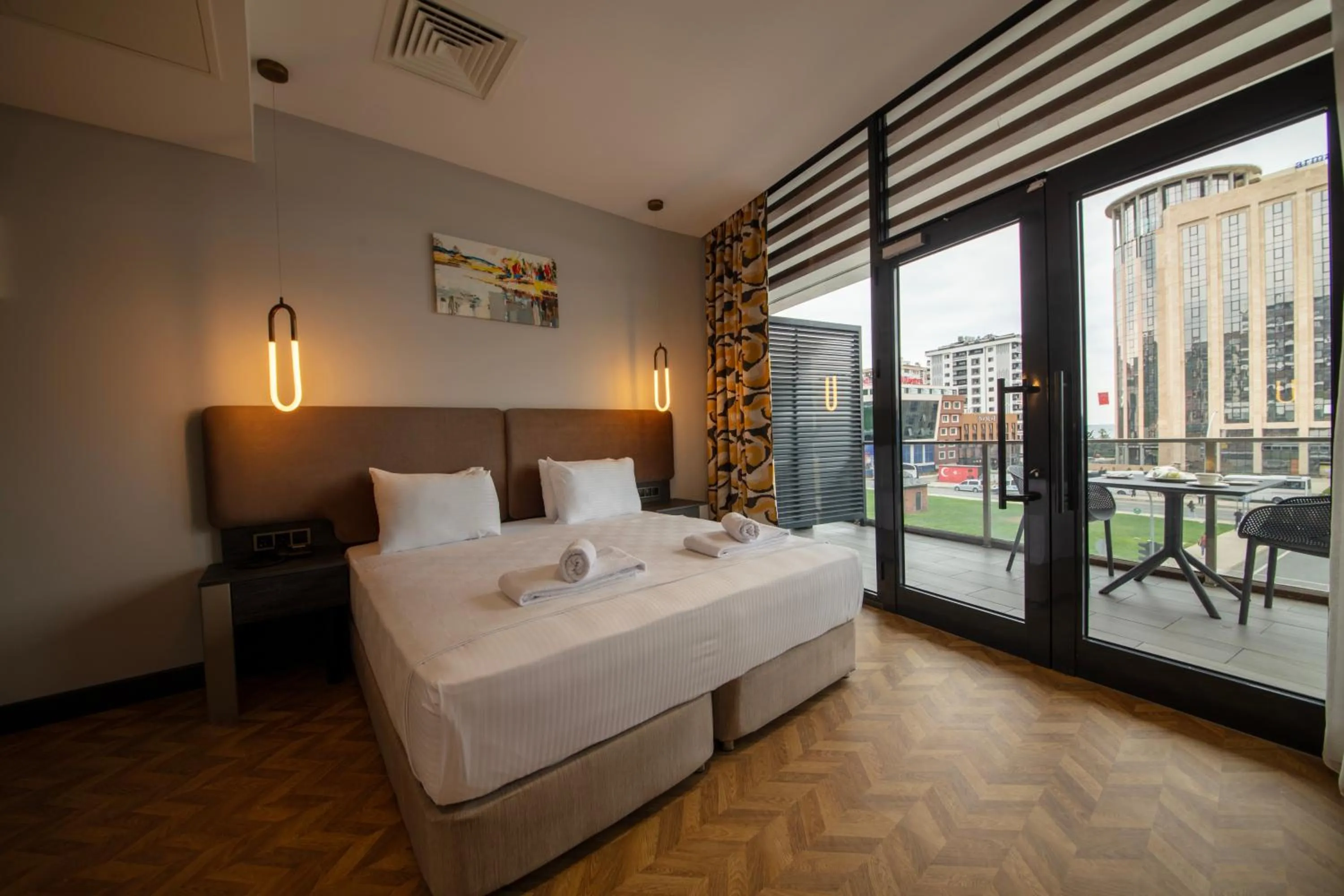 Bed in V Center Hotel