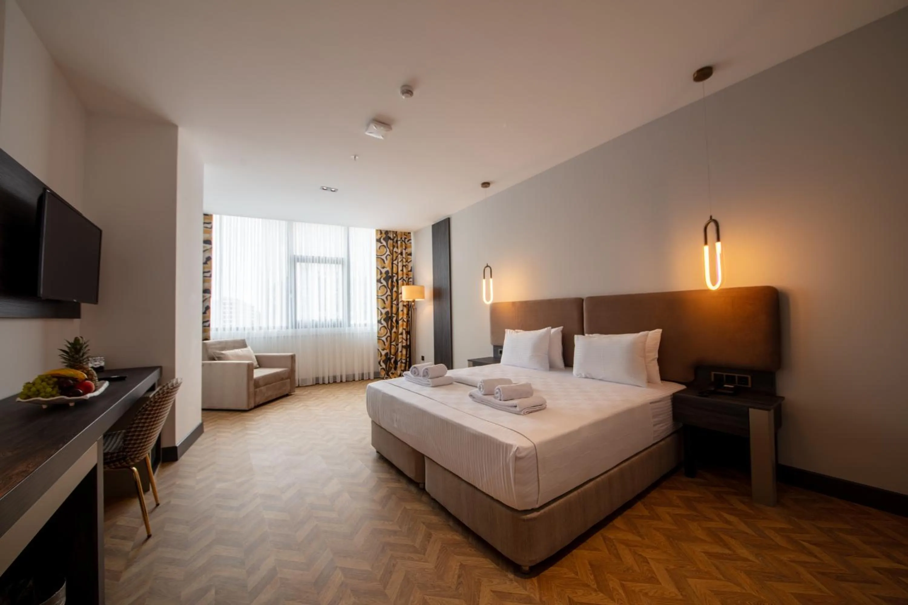 Bed in V Center Hotel