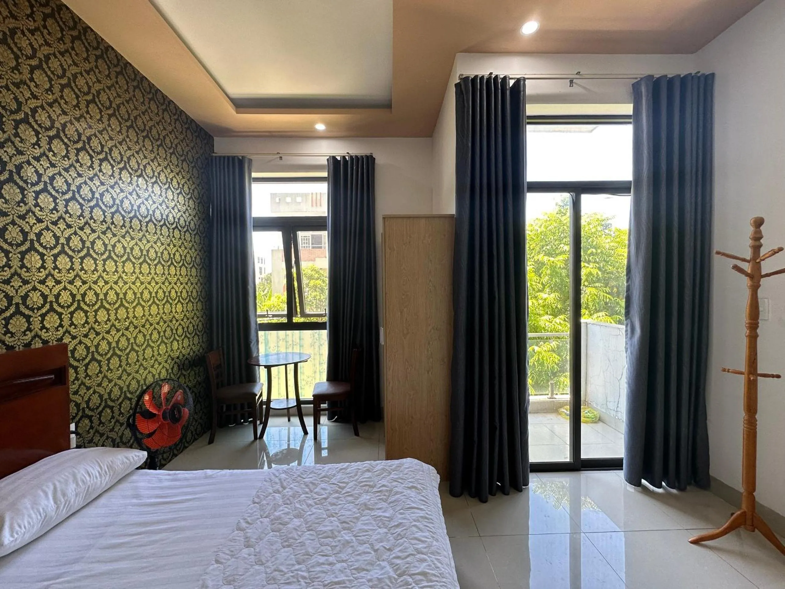 Bedroom in OYO 1191 Happy Motel