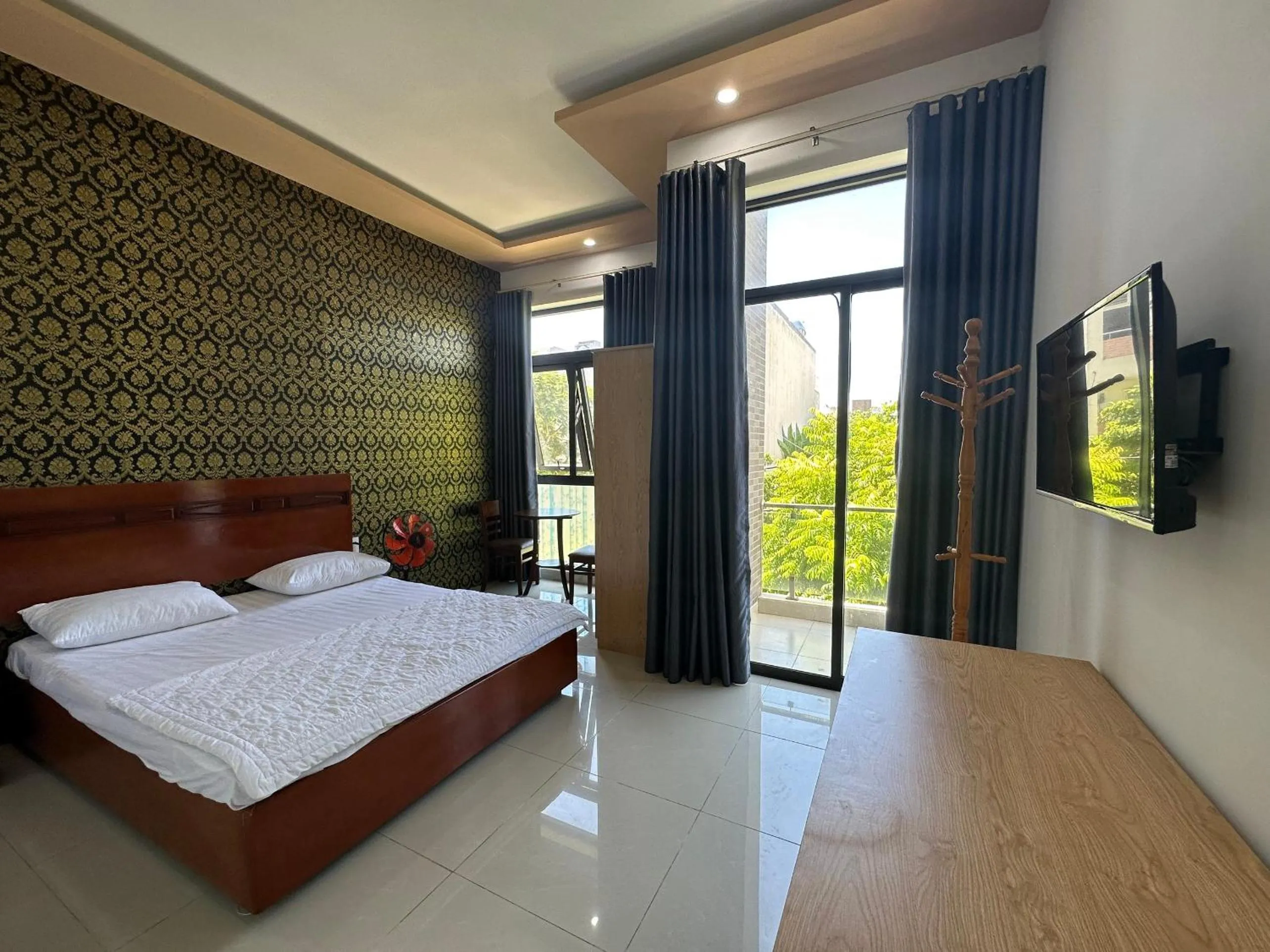 Bedroom in OYO 1191 Happy Motel