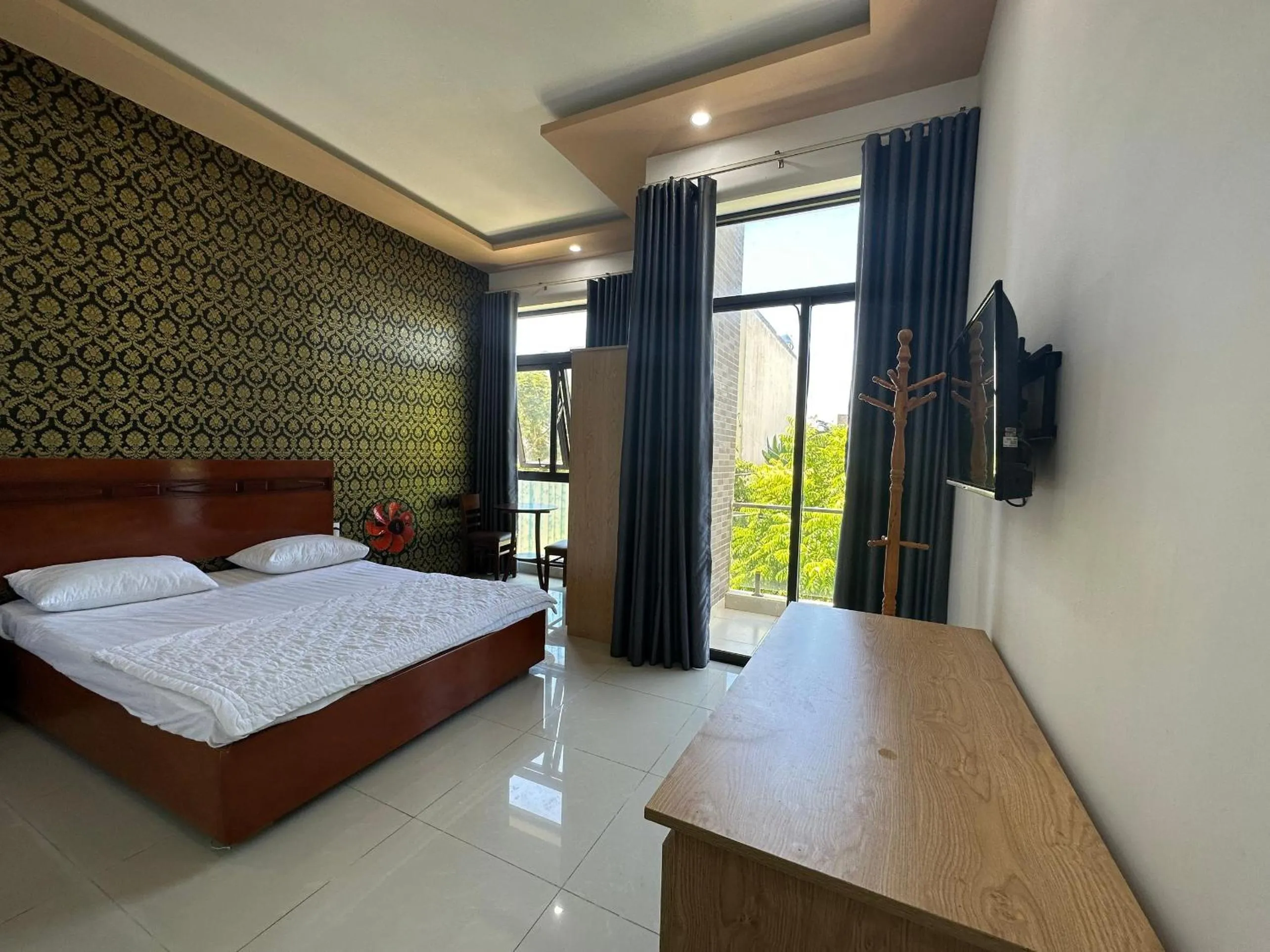 Bedroom in OYO 1191 Happy Motel