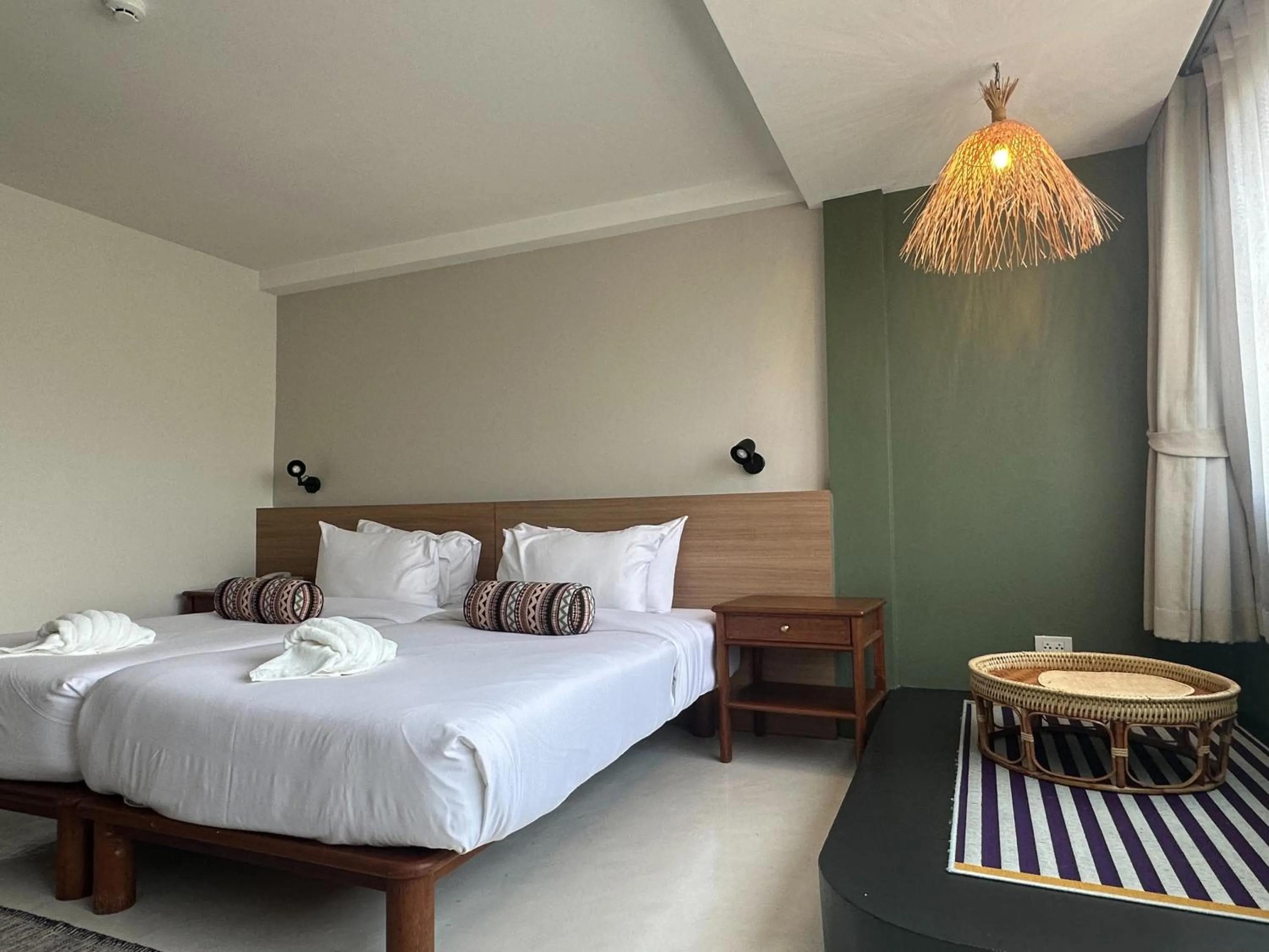 Bed in HOTEL NUU CHIANG MAI