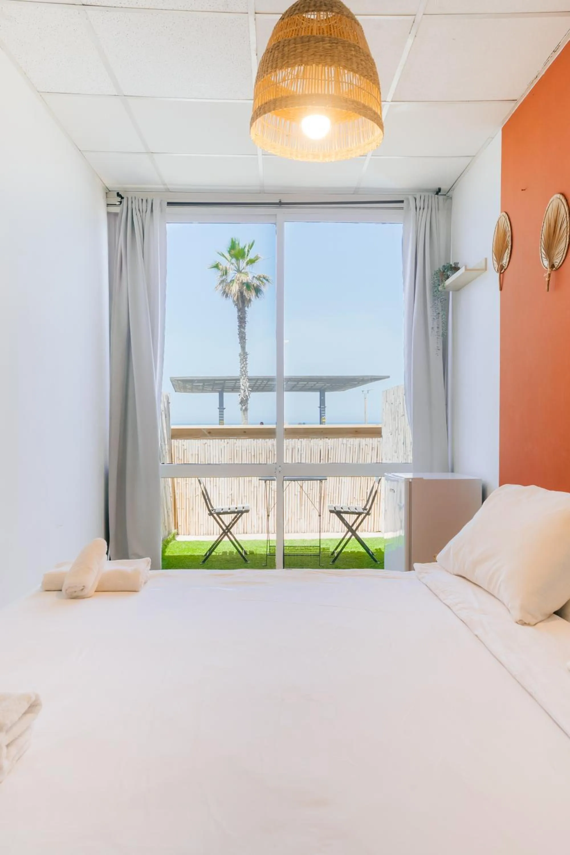 Bed in Central Beach Hotel