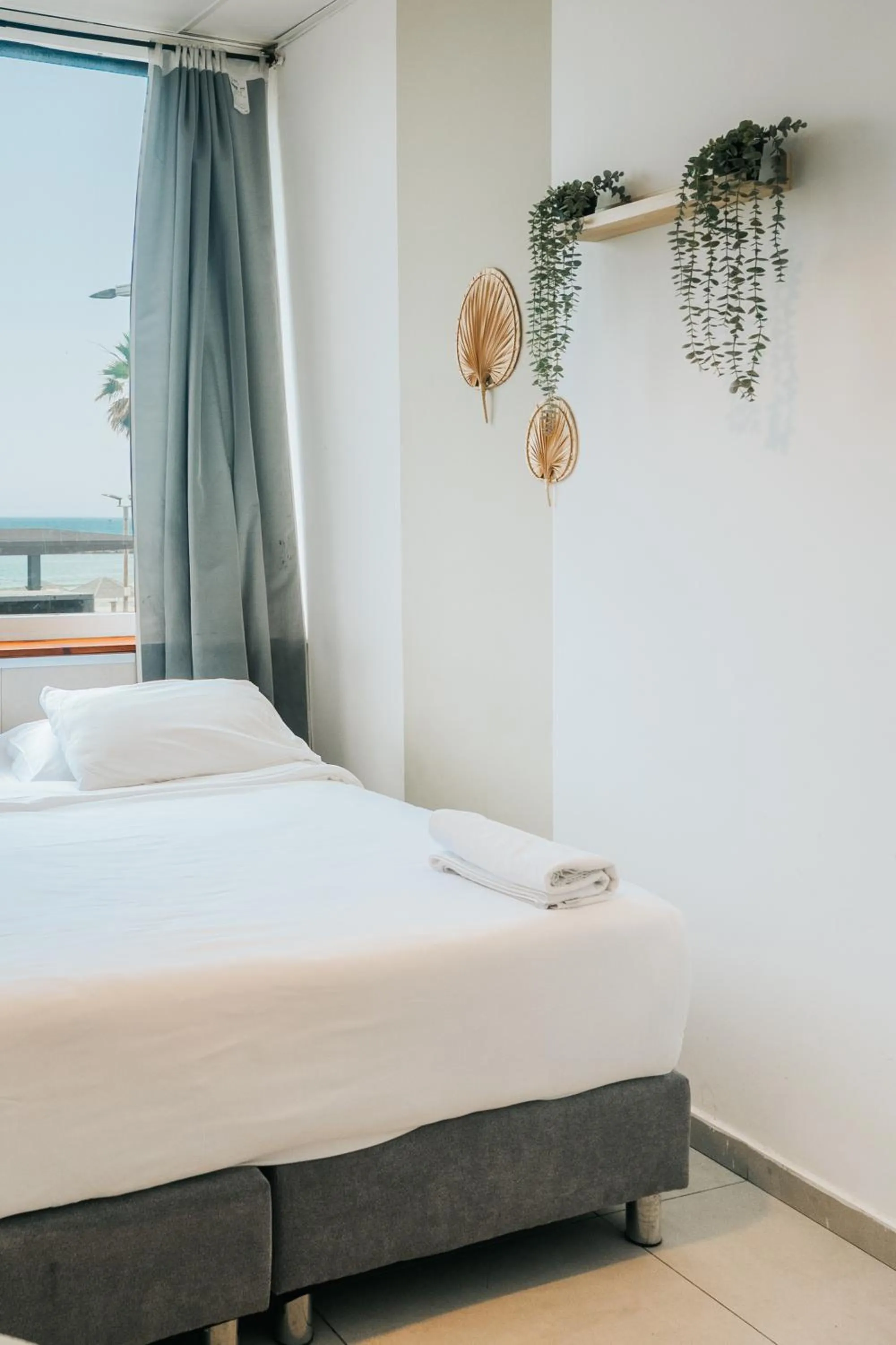 Bed in Central Beach Hotel