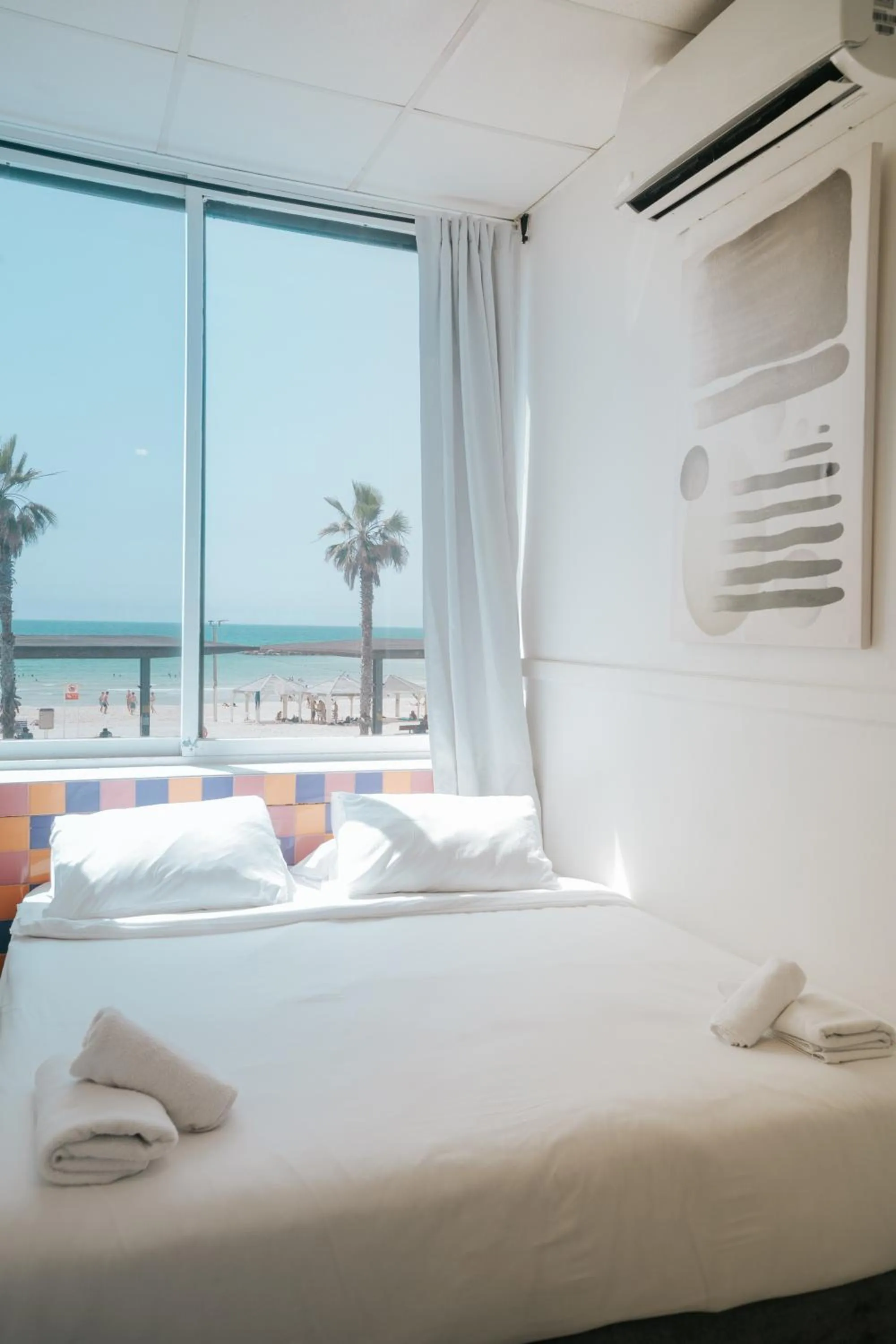 Bed in Central Beach Hotel