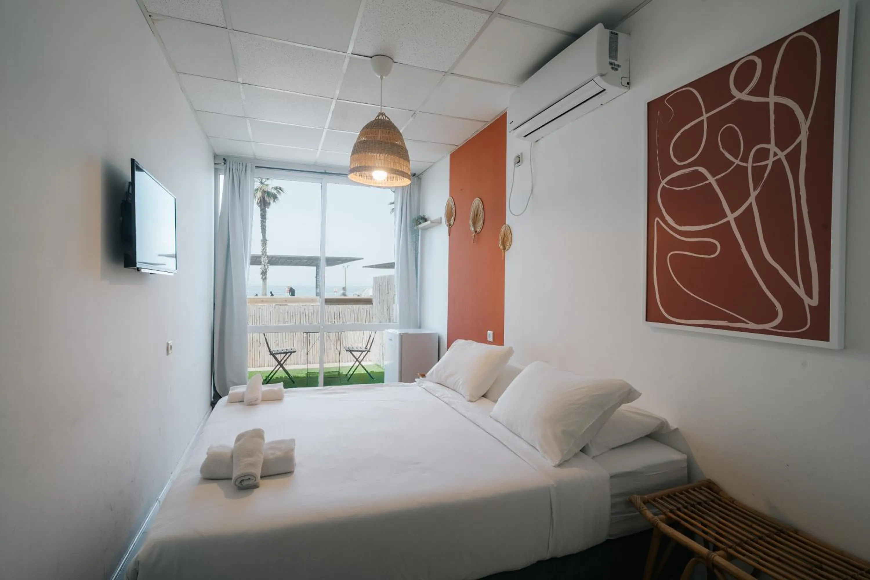 Bed in Central Beach Hotel