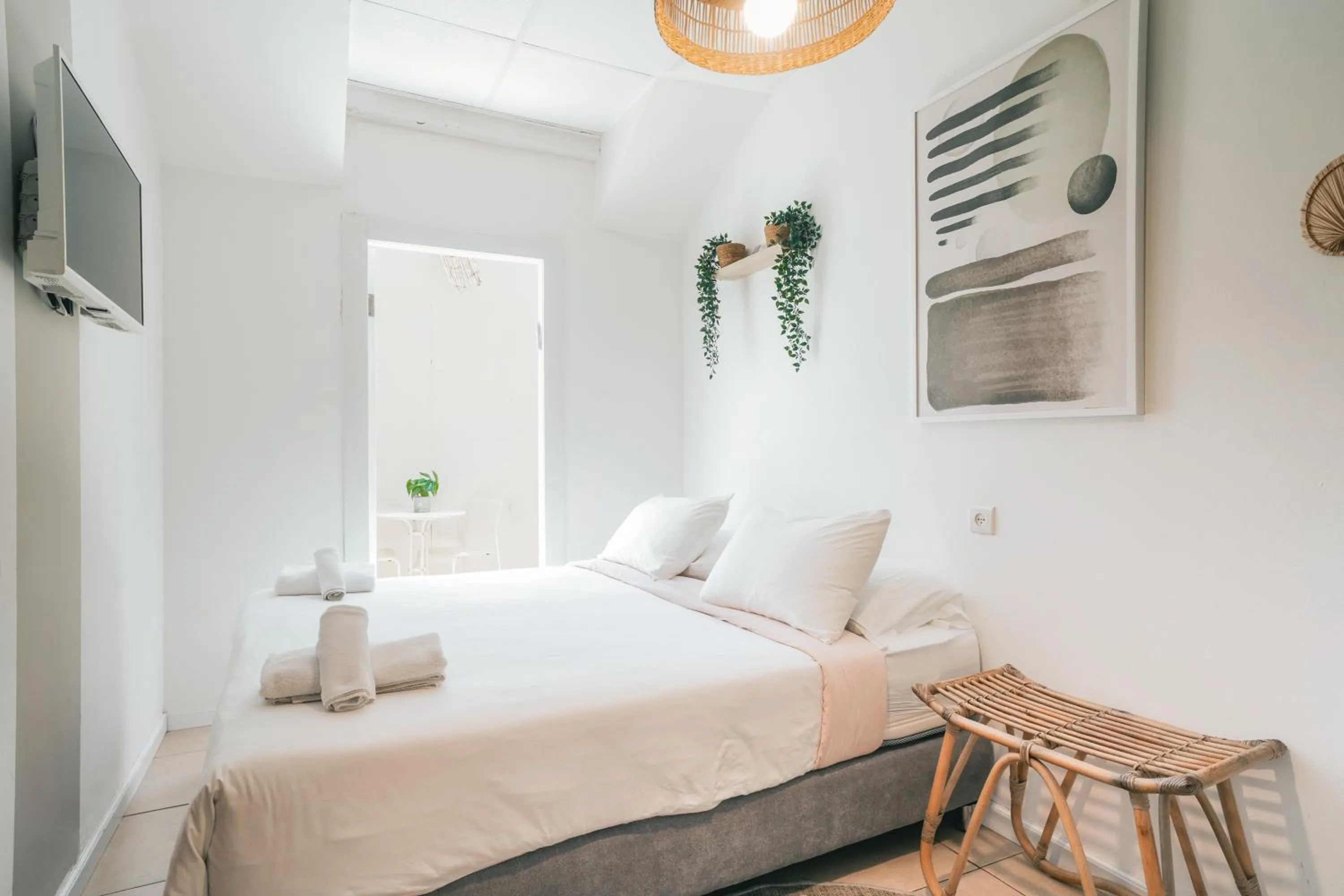 Bed in Central Beach Hotel