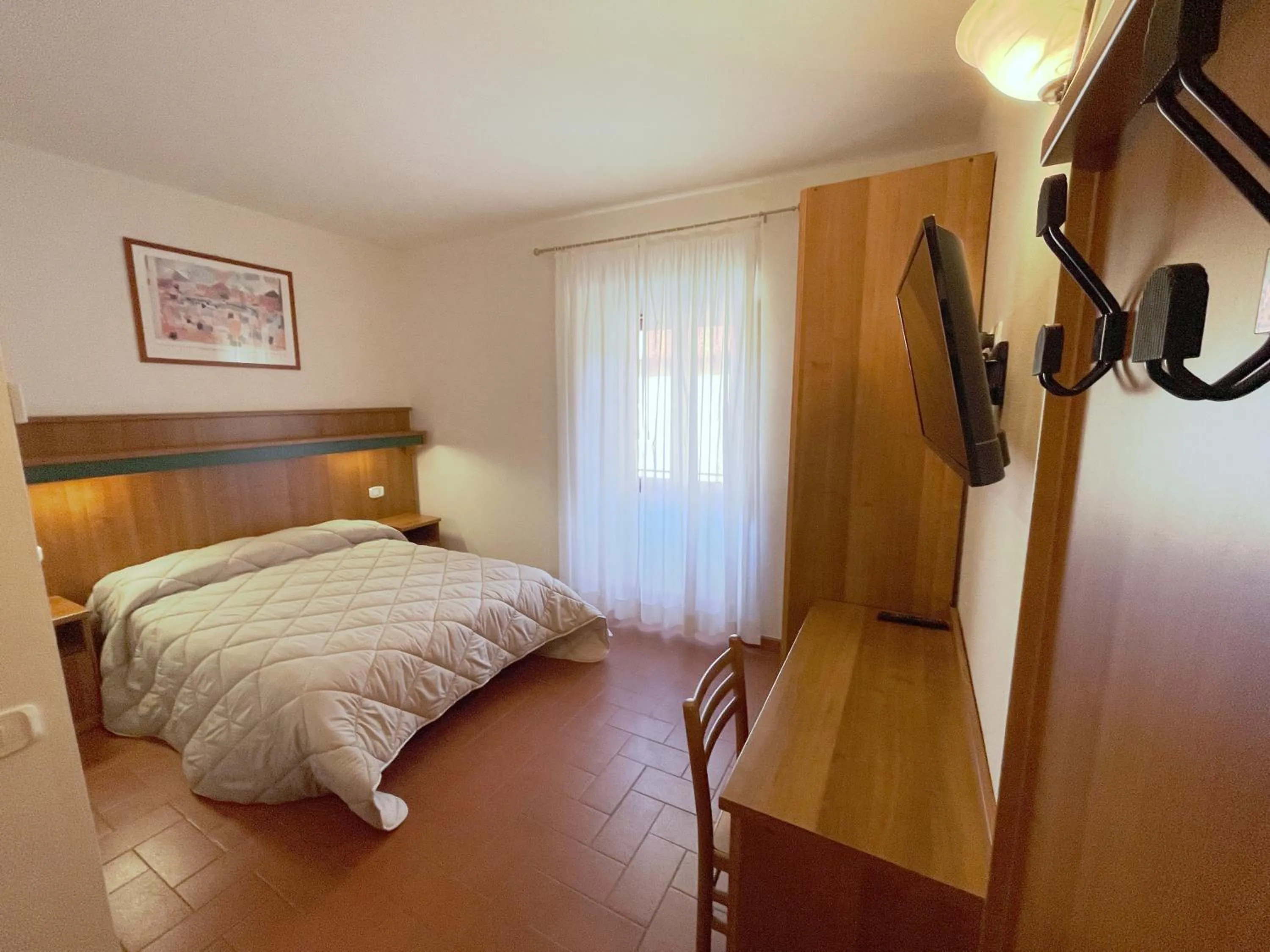 Bedroom, Bed in Hotel Rifugio la Foresta