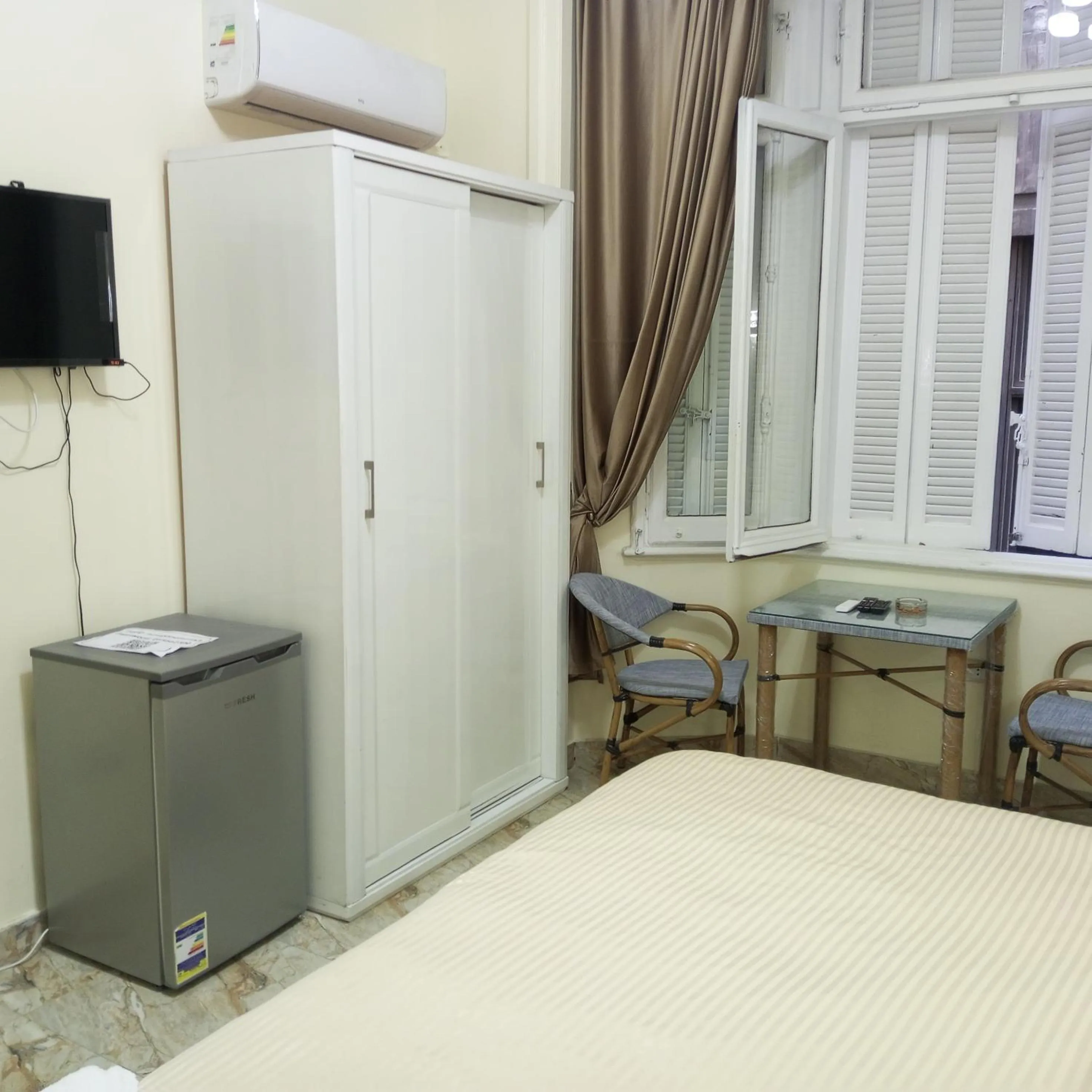 Photo of the whole room, Bed in New Panorama Palace