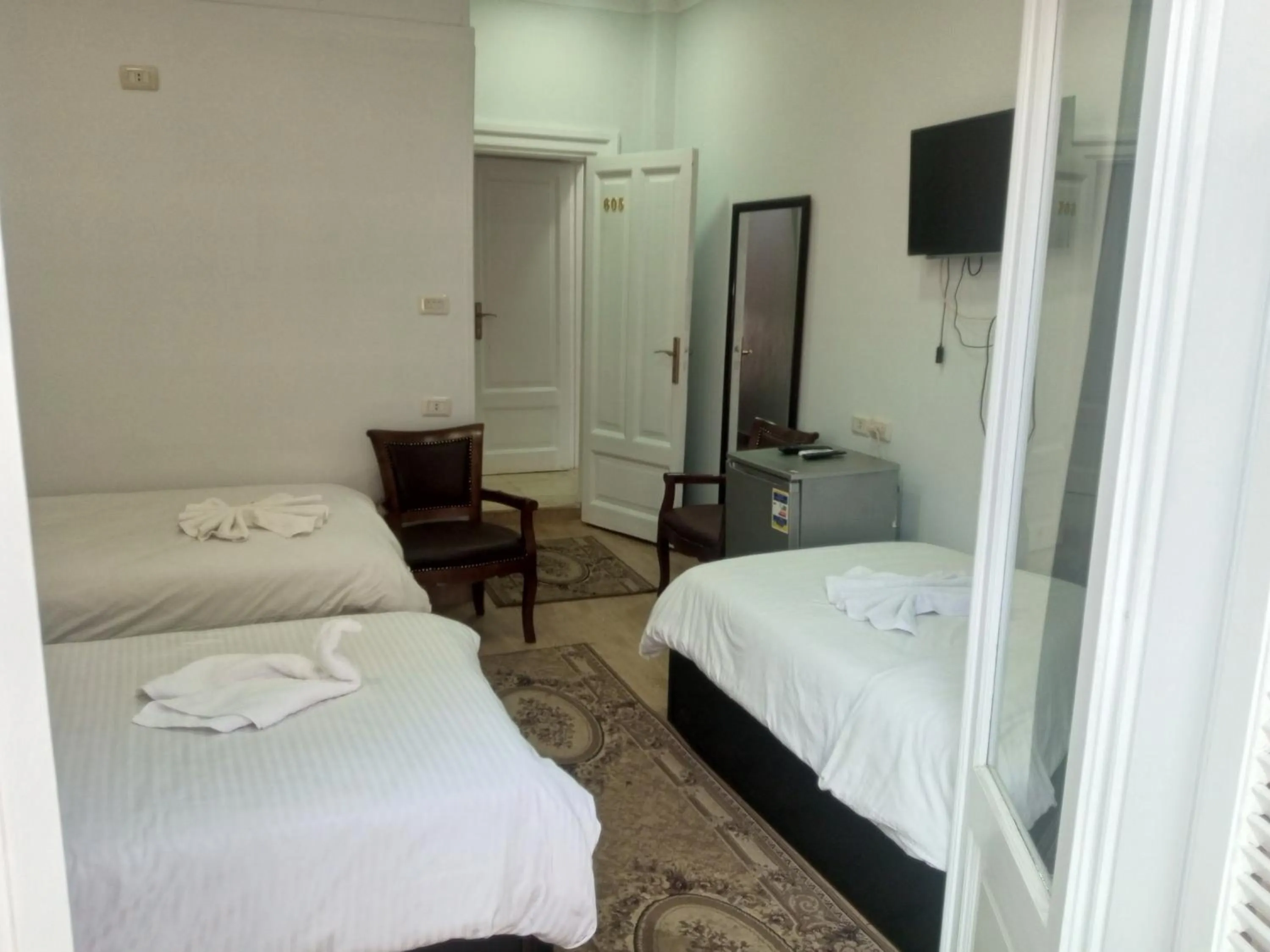 Photo of the whole room, Bed in New Panorama Palace