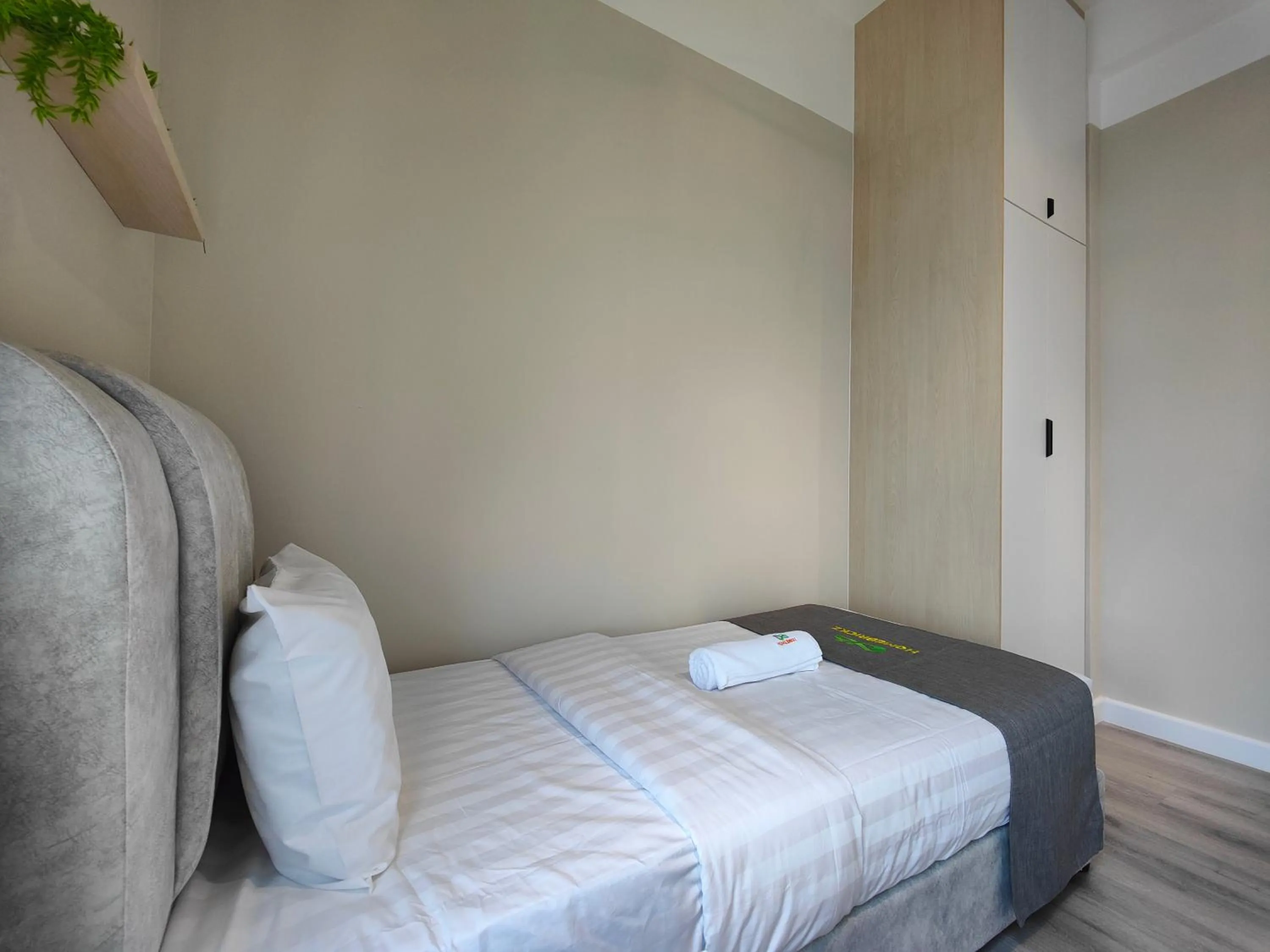 Photo of the whole room, Bed in Cubic Botanical Suites Bangsar South by HomeBrickz