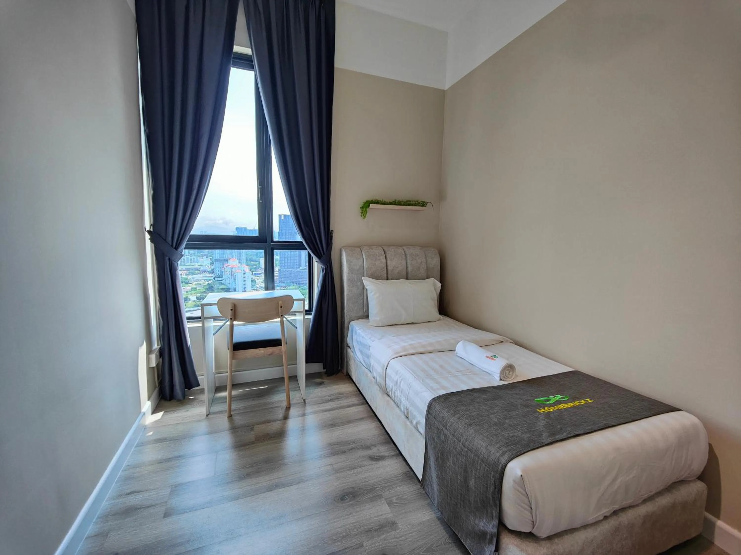 Bed in Cubic Botanical Suites Bangsar South by HomeBrickz