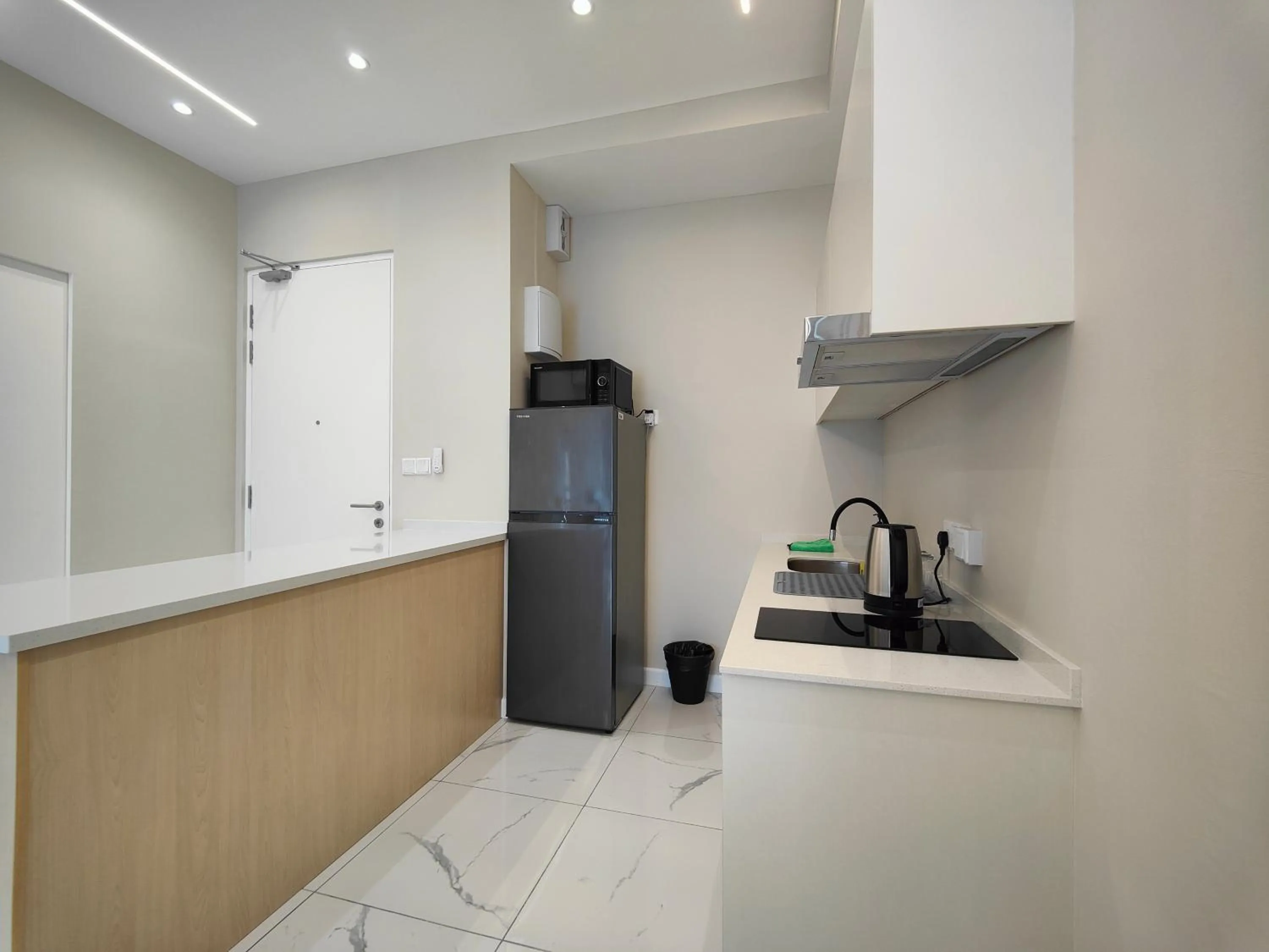 Kitchen or kitchenette in Cubic Botanical Suites Bangsar South by HomeBrickz