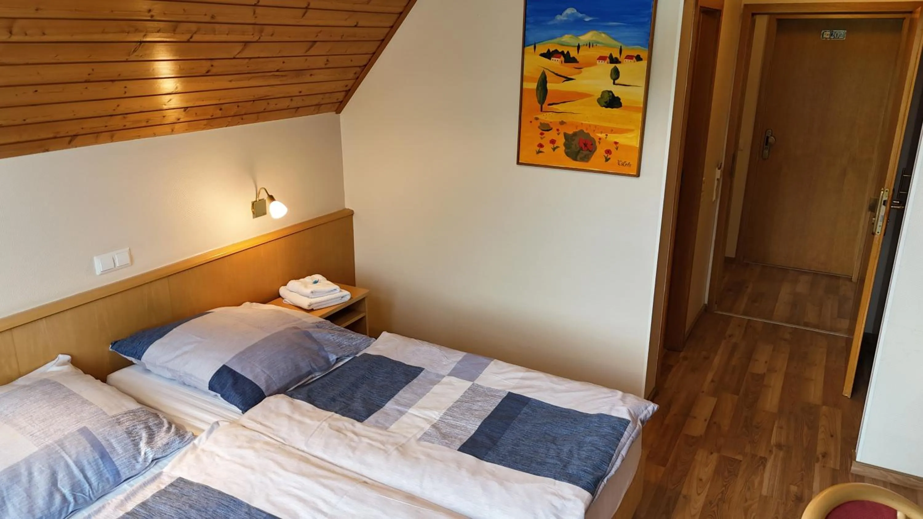 Bed in Hotel Strand-Café