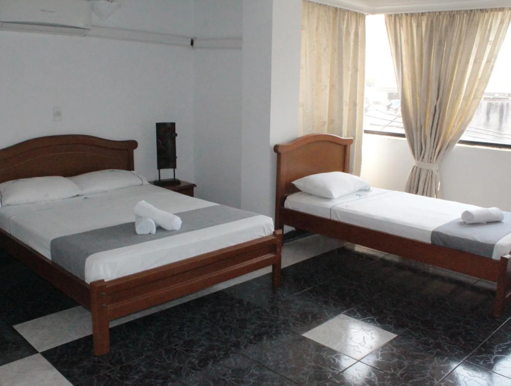 Photo of the whole room, Bed in HOTEL DINASTIA REAL NEIVA