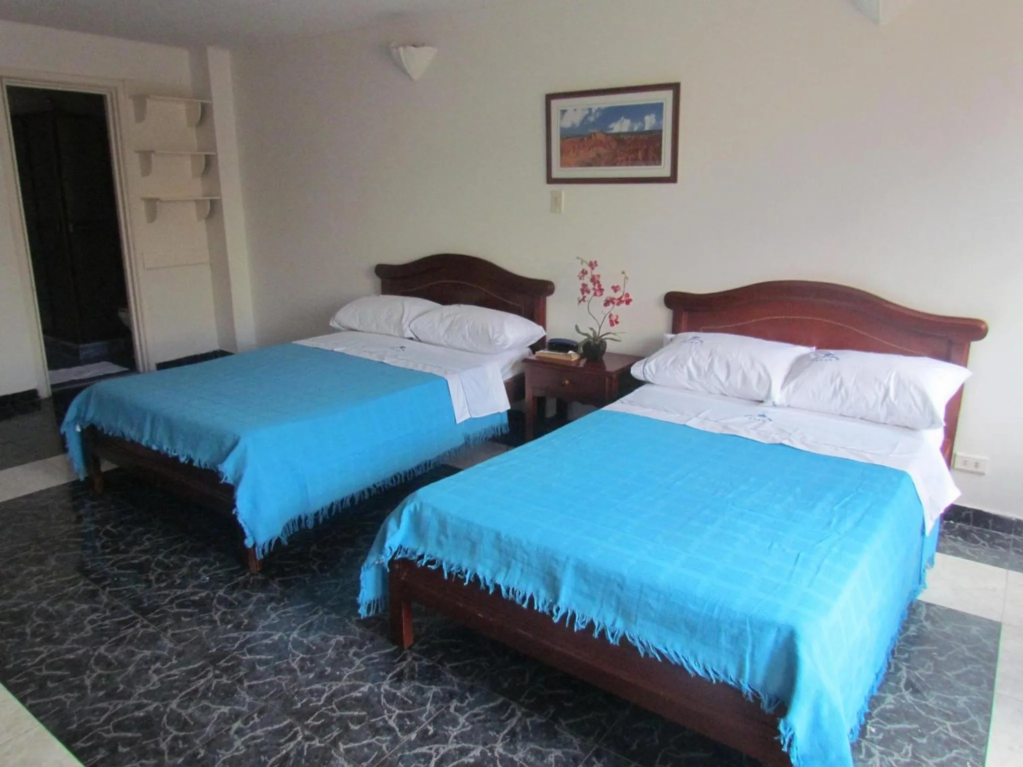 Photo of the whole room, Bed in HOTEL DINASTIA REAL NEIVA