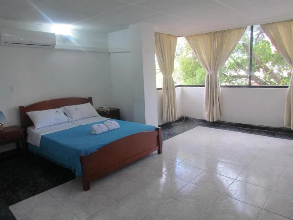 Photo of the whole room, Bed in HOTEL DINASTIA REAL NEIVA