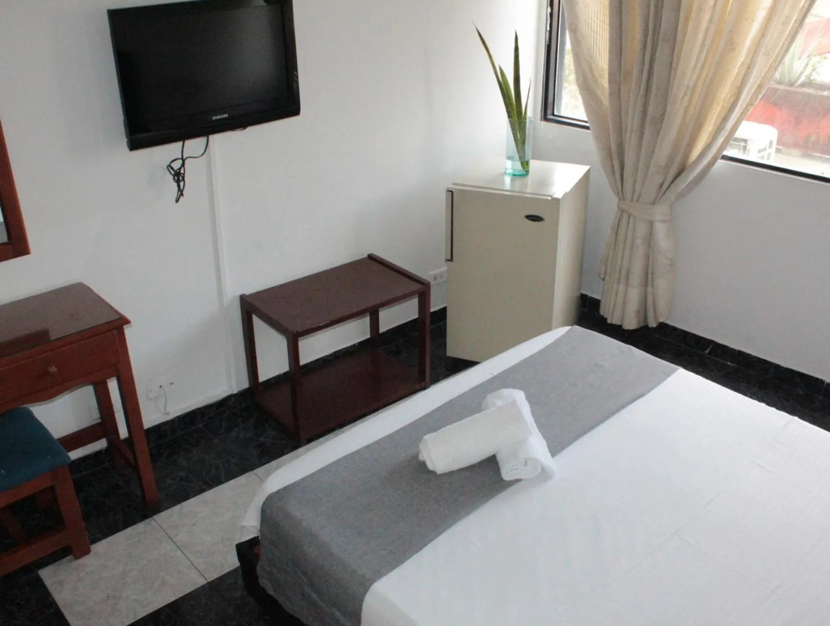 Photo of the whole room, Bed in HOTEL DINASTIA REAL NEIVA