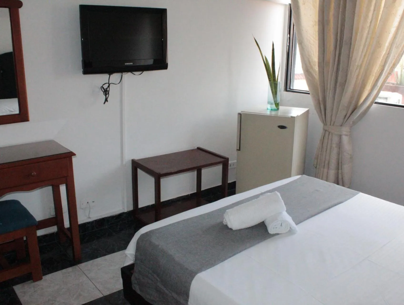 Photo of the whole room, Bed in HOTEL DINASTIA REAL NEIVA