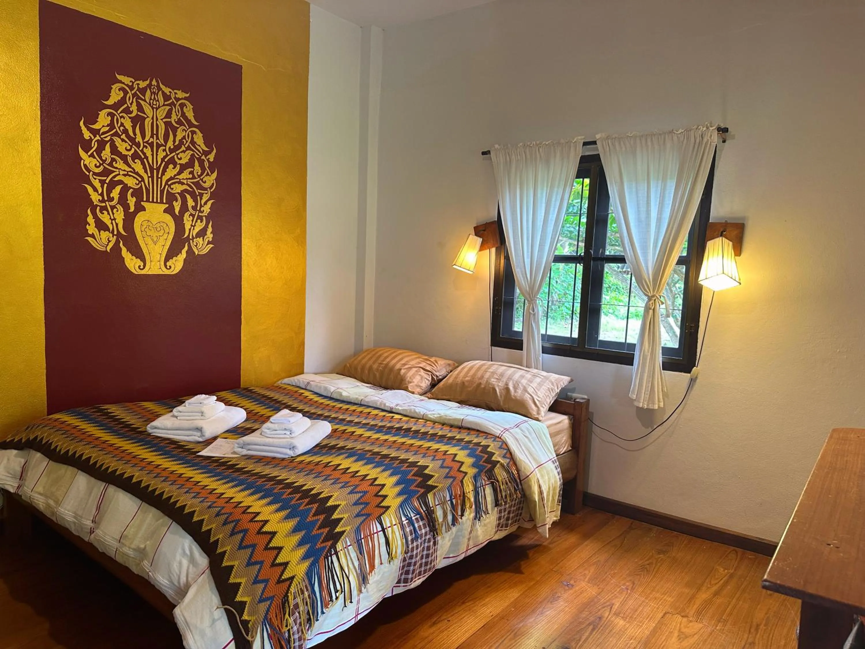 Bed in Pairadise Hotel