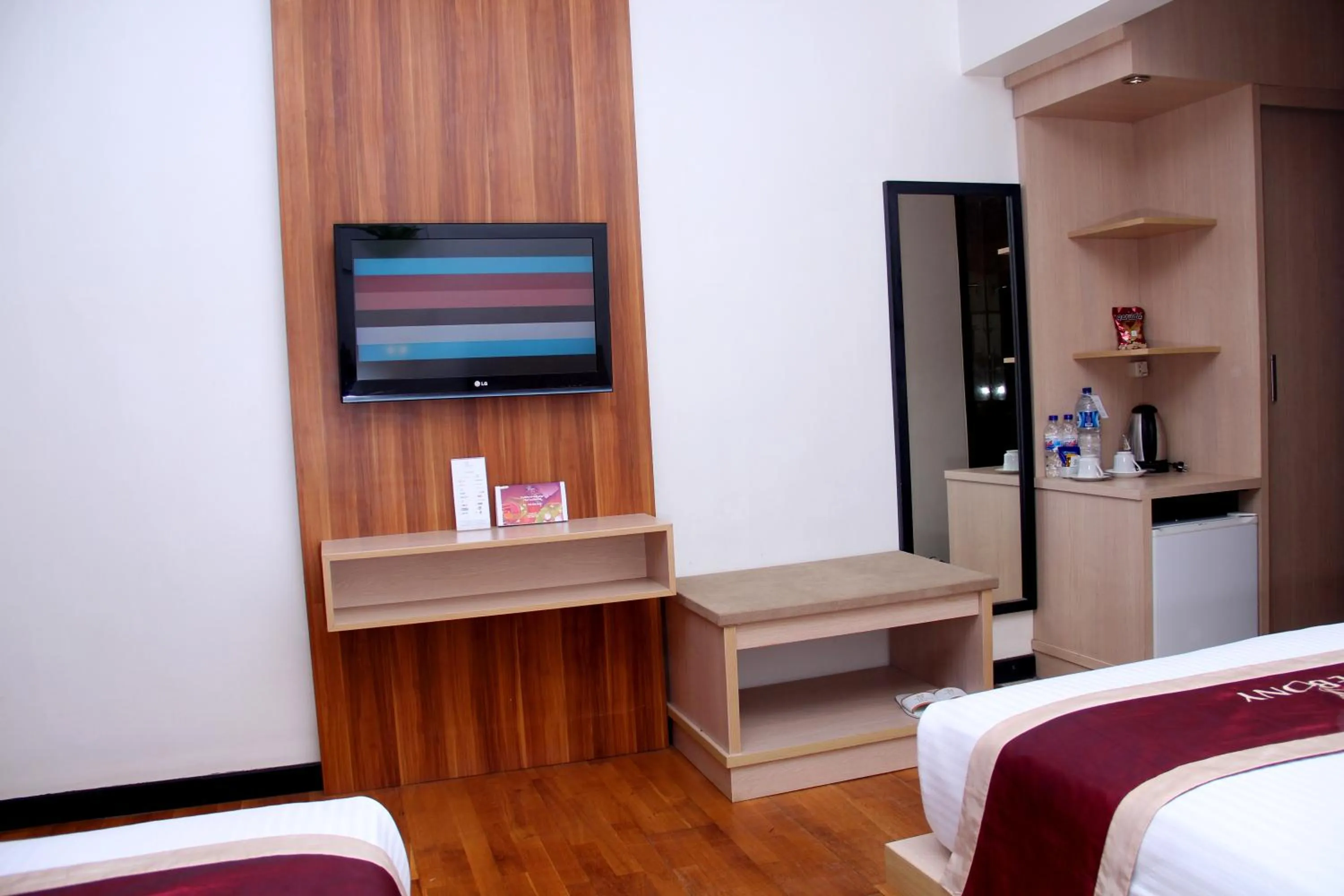 TV and multimedia, Bed in Hotel Ebony Batulicin