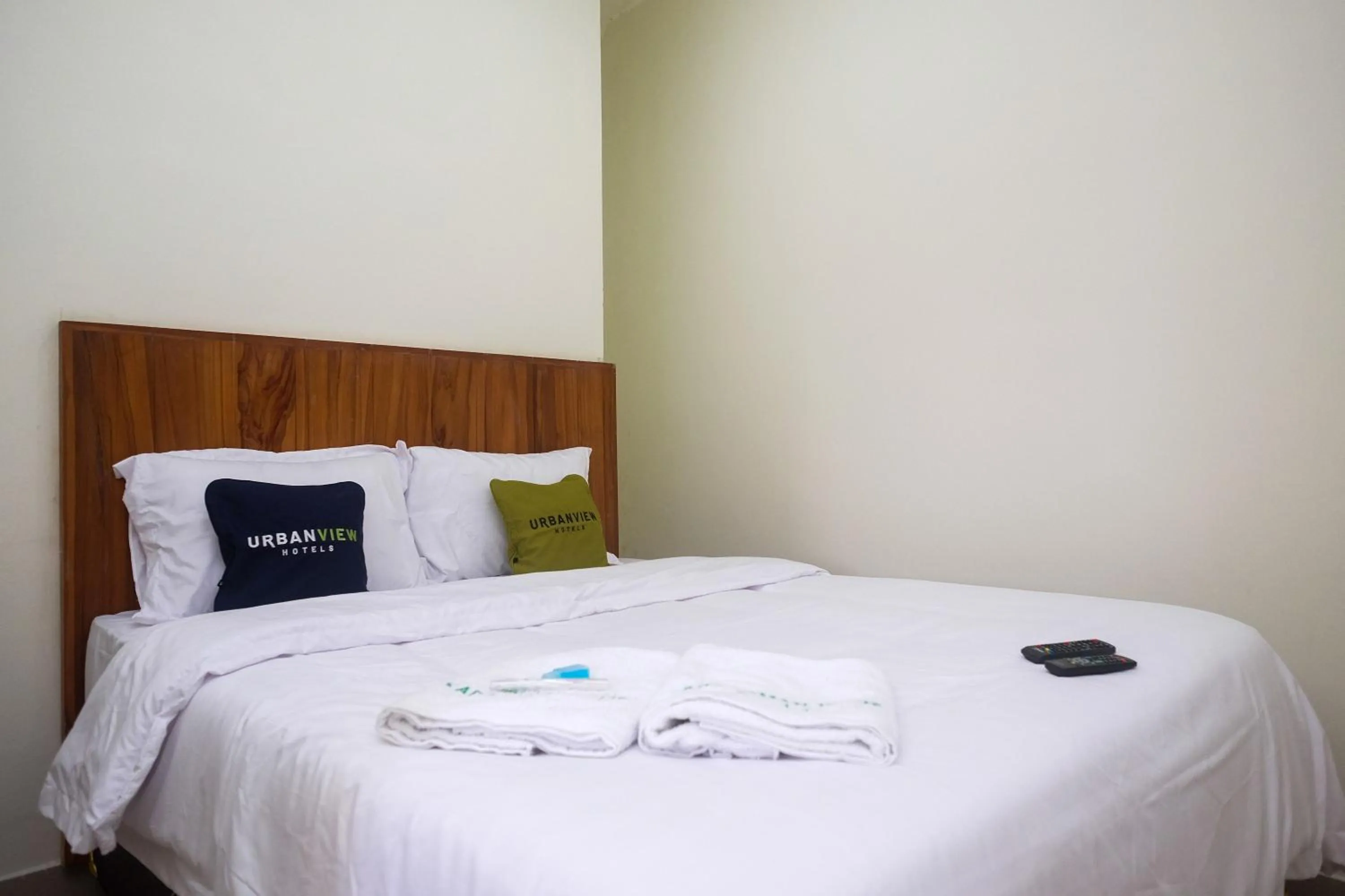 Bed in Urbanview Syariah Kadarman Home Laweyan by RedDoorz