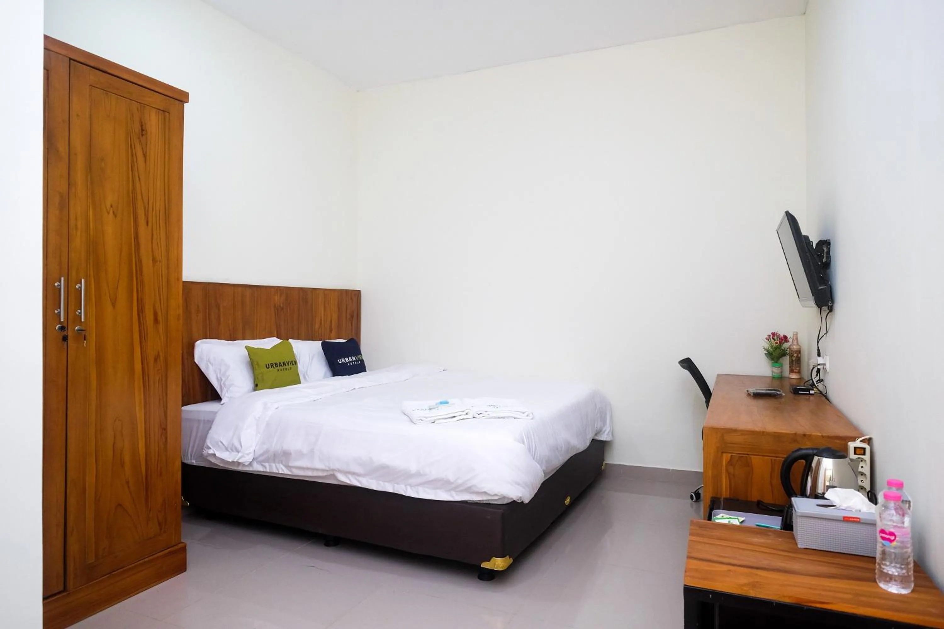 Bed in Urbanview Syariah Kadarman Home Laweyan by RedDoorz