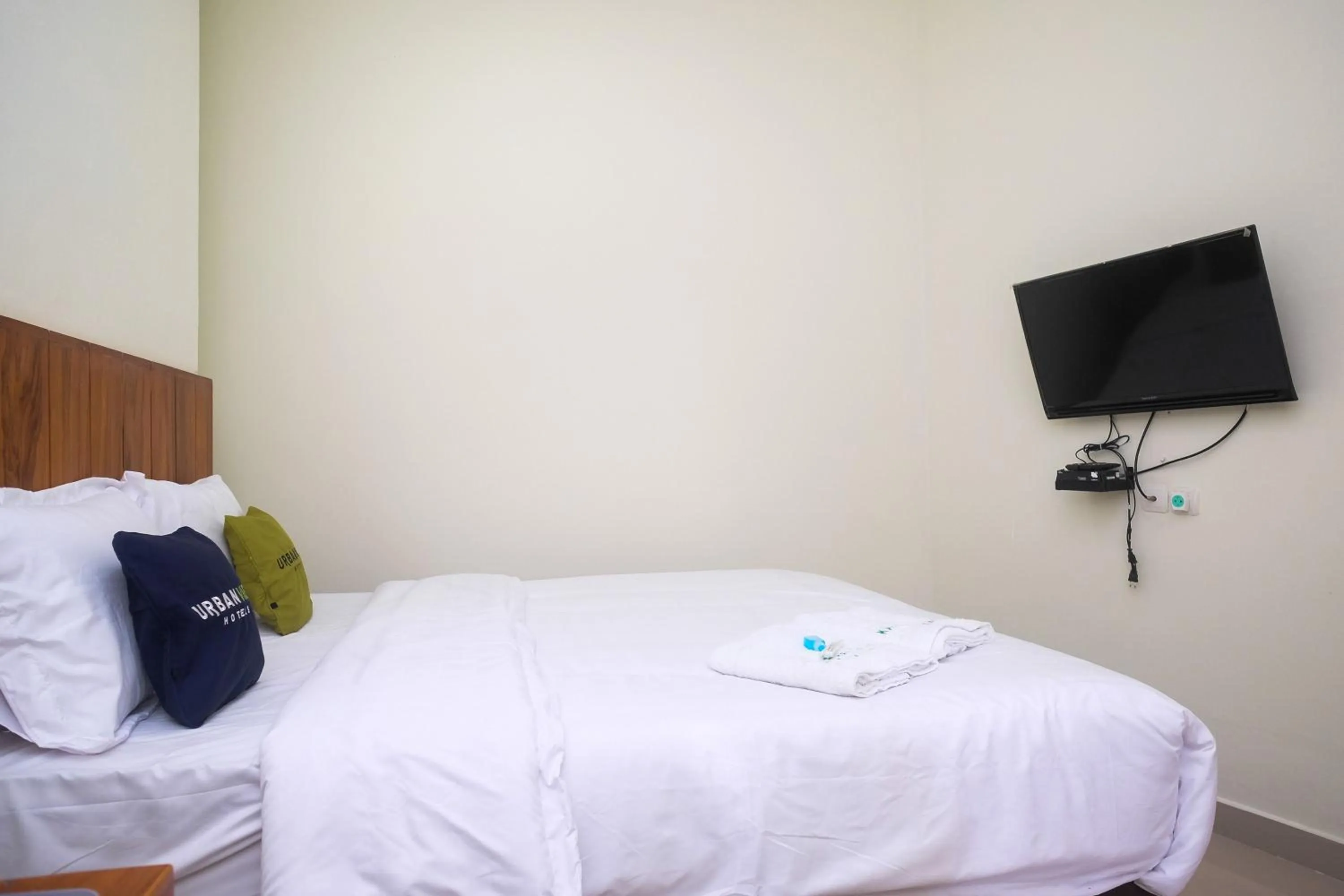 Bed in Urbanview Syariah Kadarman Home Laweyan by RedDoorz