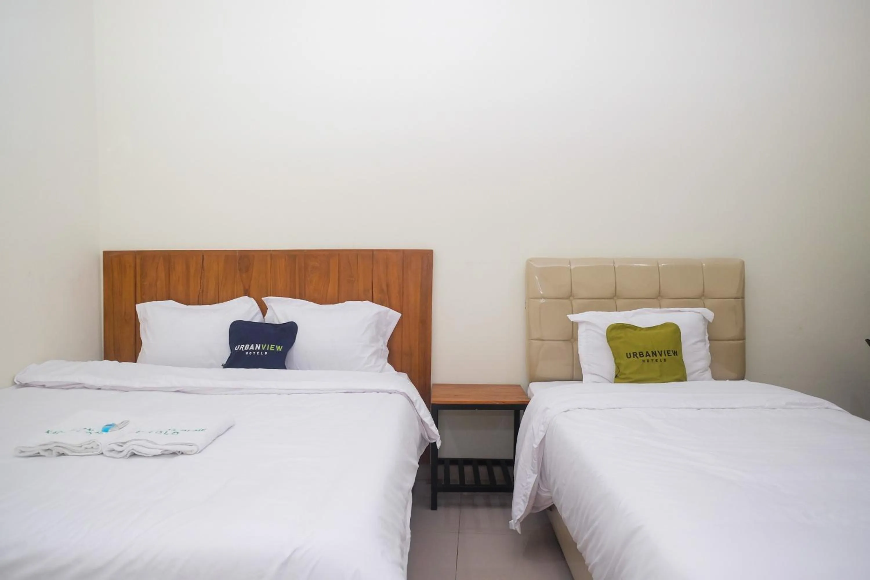 Bed in Urbanview Syariah Kadarman Home Laweyan by RedDoorz