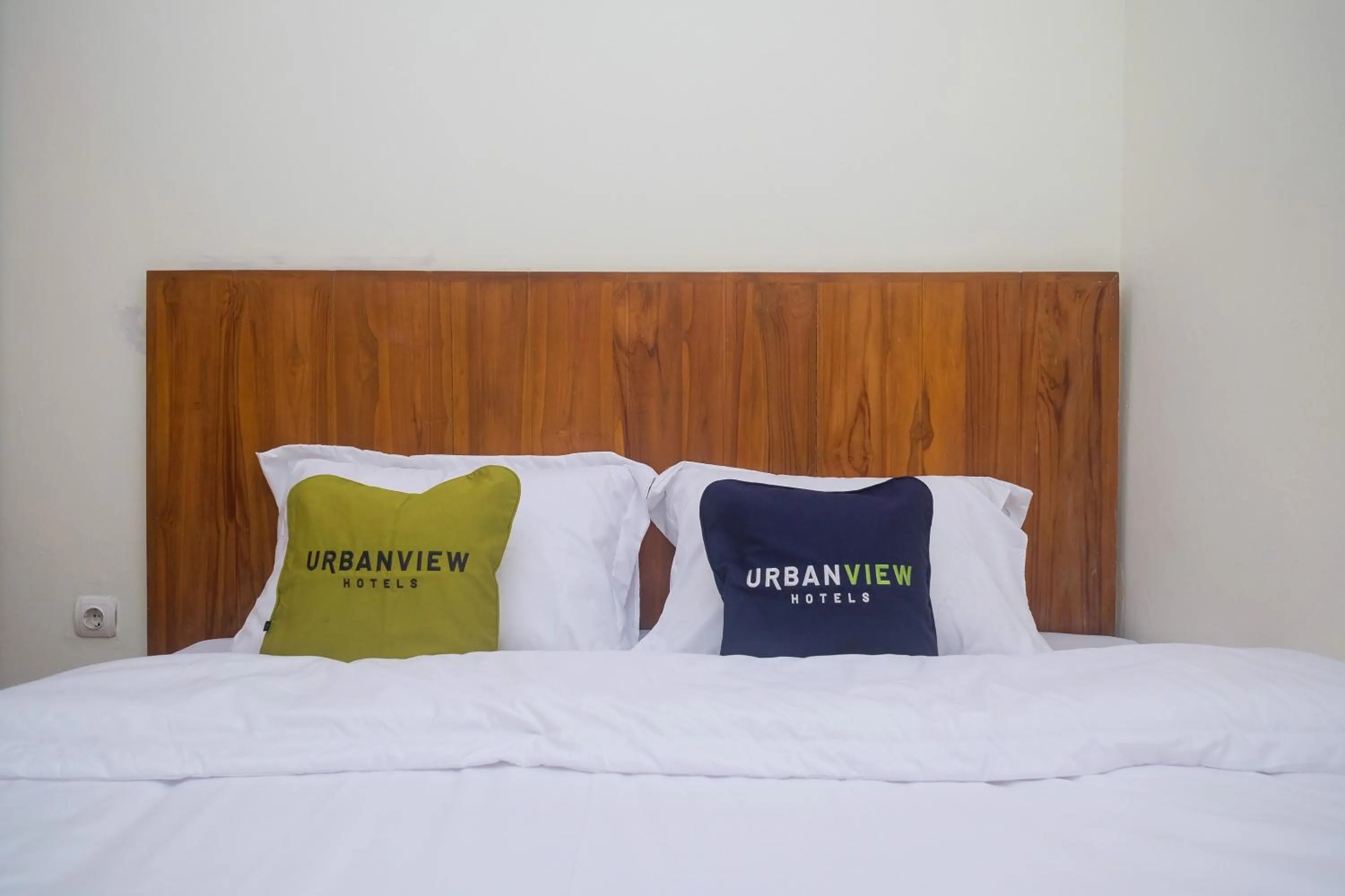 Bed in Urbanview Syariah Kadarman Home Laweyan by RedDoorz