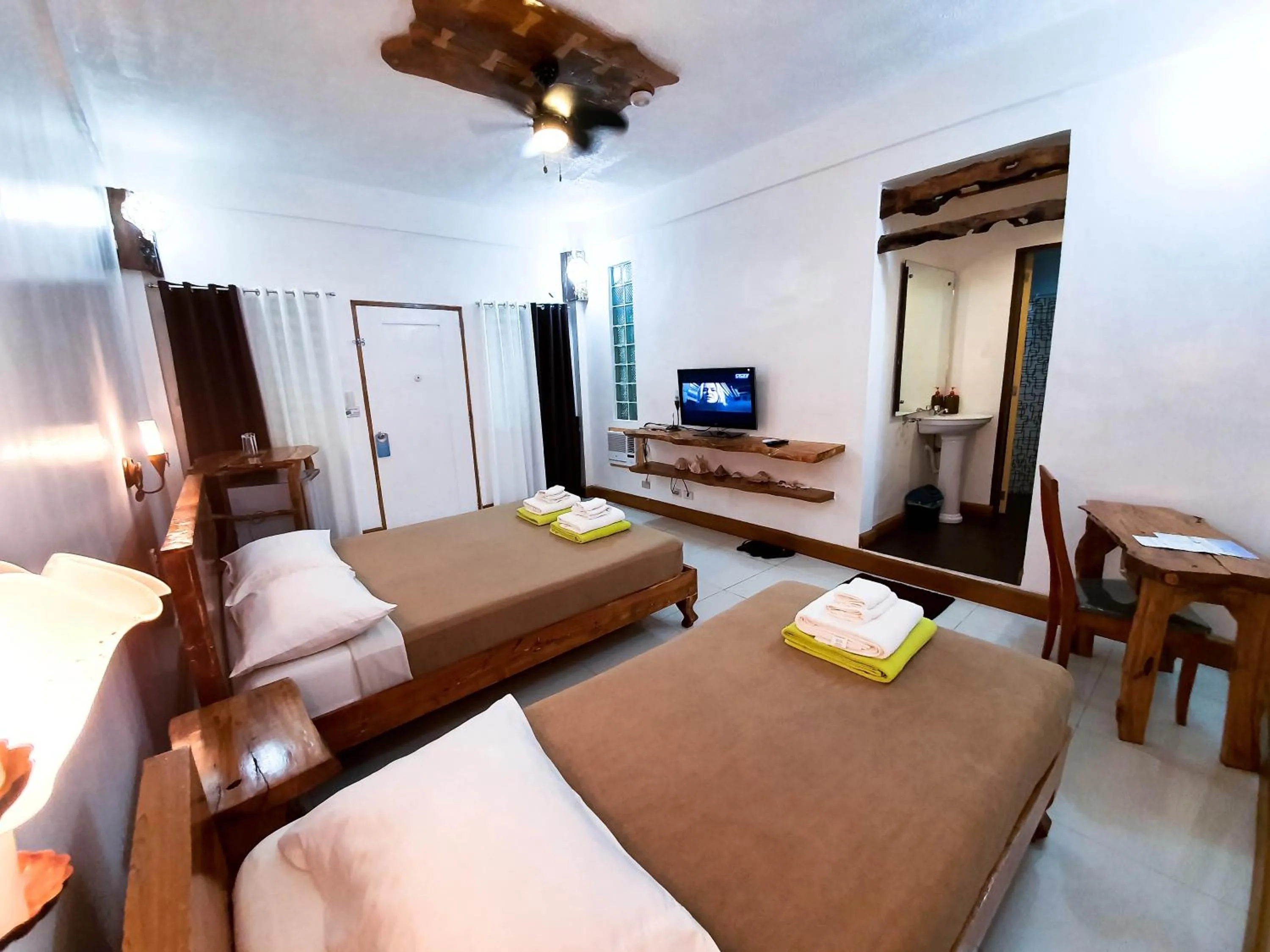 Photo of the whole room, Bed in Cocoloco Beach Resort