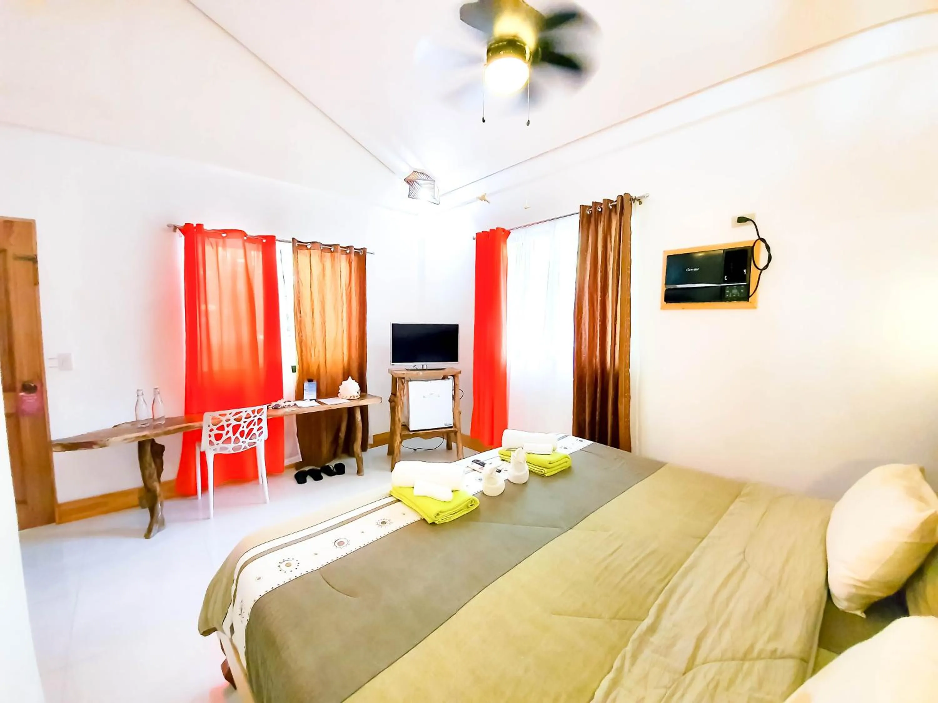 Photo of the whole room, Bed in Cocoloco Beach Resort