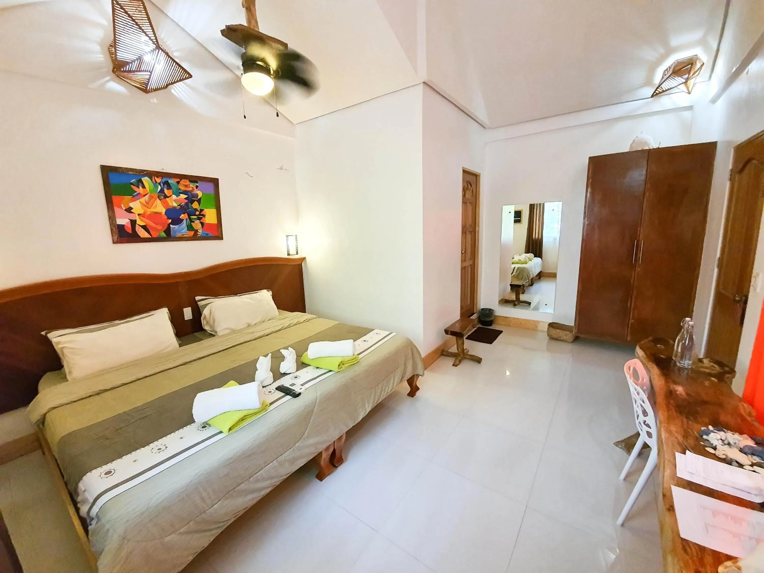 Photo of the whole room, Bed in Cocoloco Beach Resort