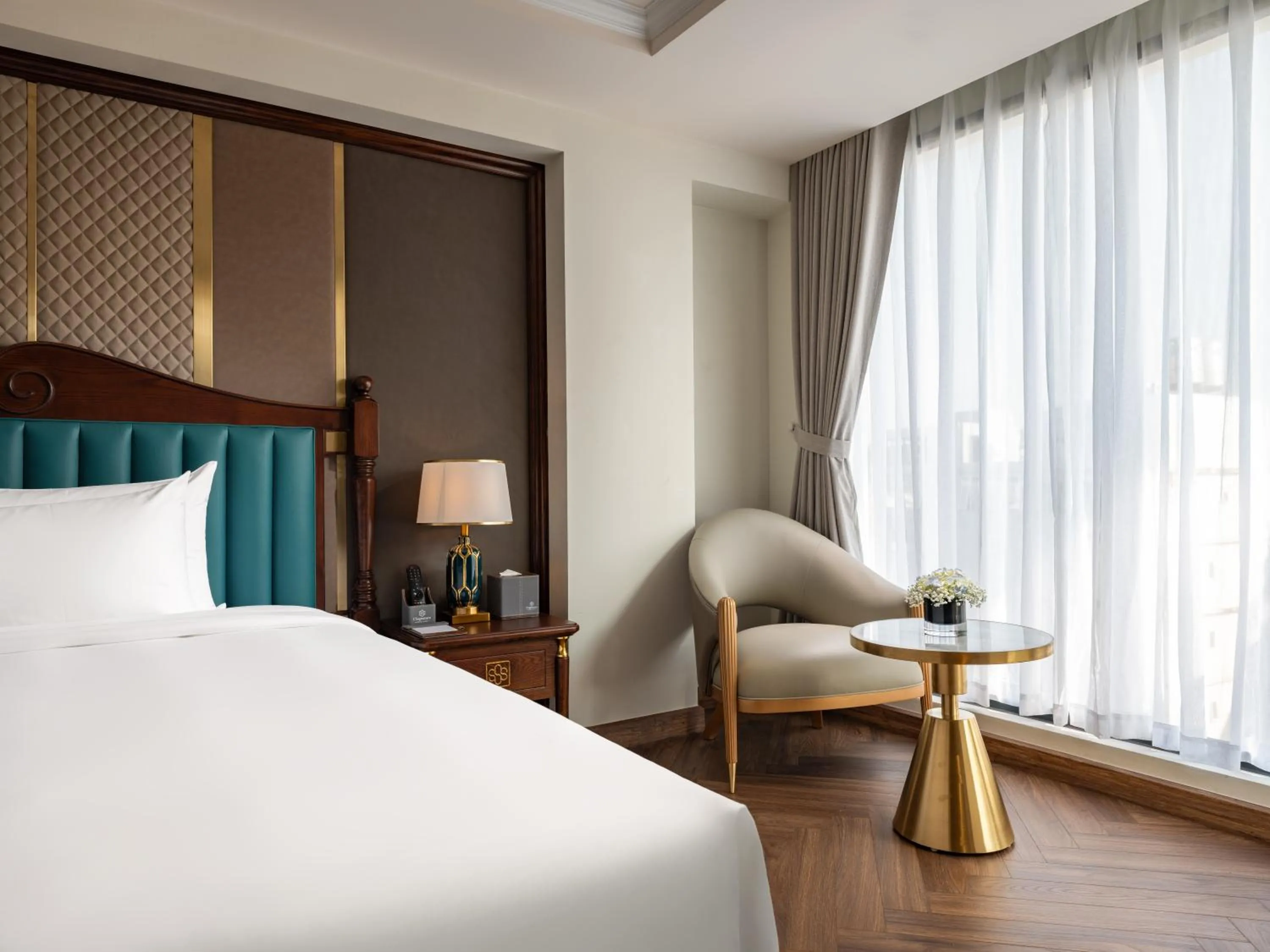 Seating area, Bed in L'Signature Hotel & Spa