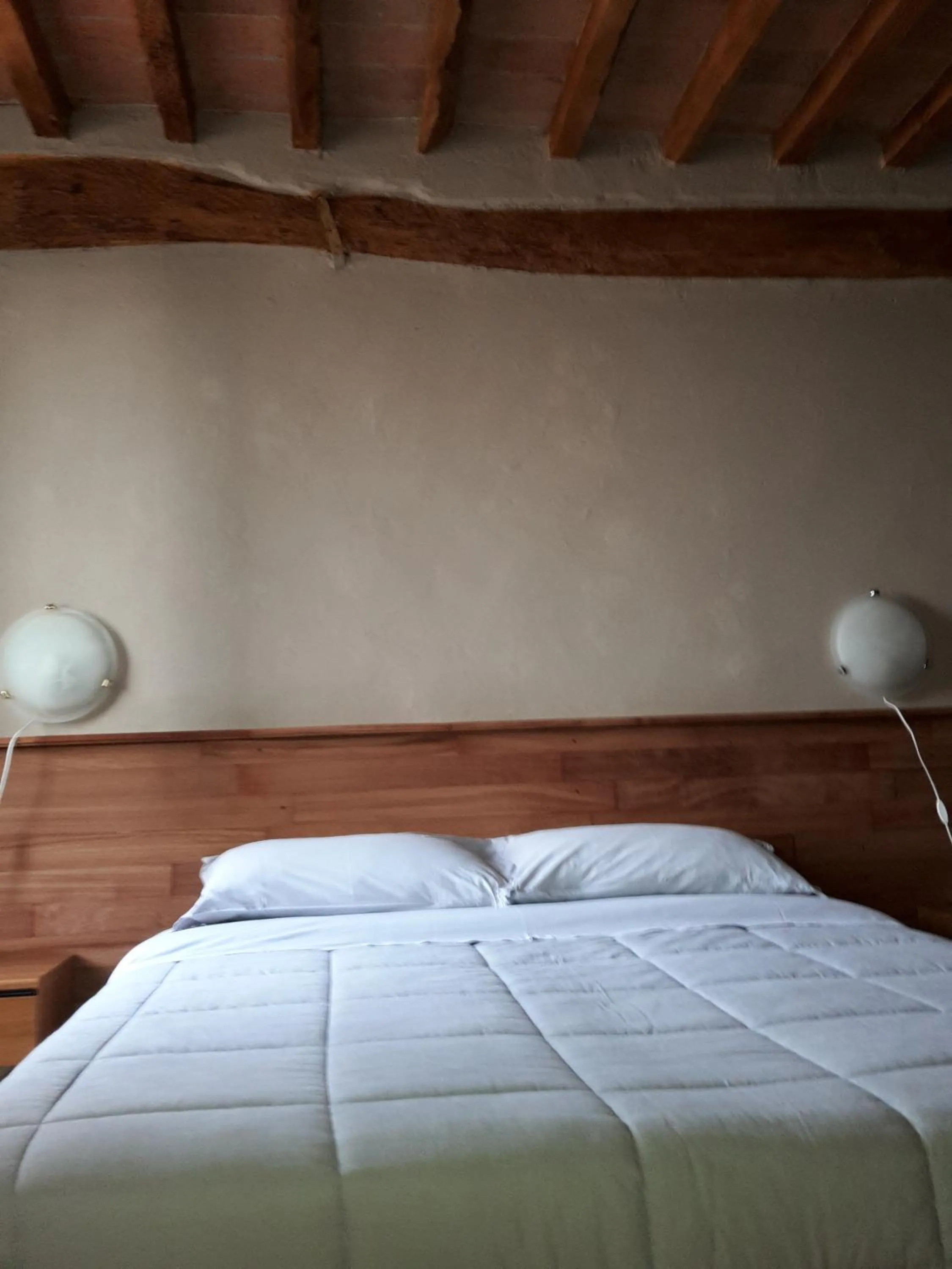 Photo of the whole room, Bed in Agriturismo Dosso al Porto