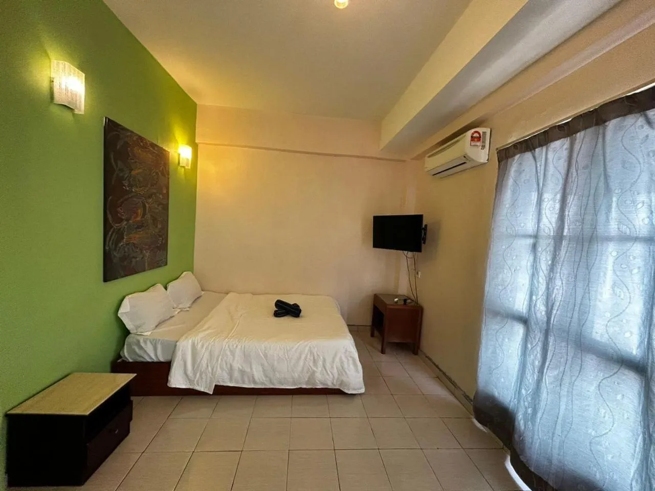 Bed in Hotel Harbour Stay