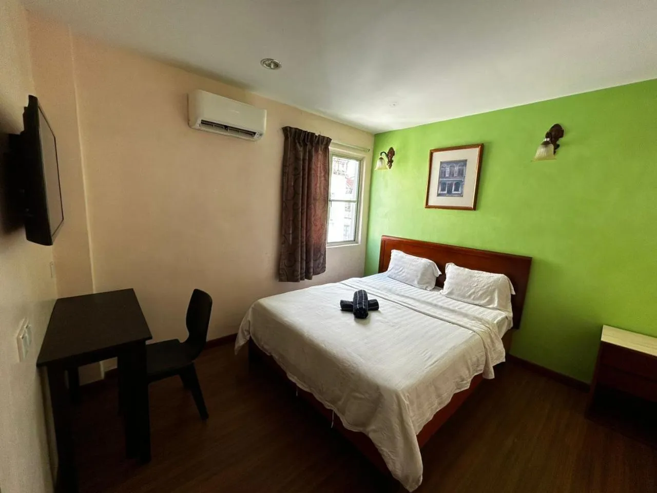 Bed in Hotel Harbour Stay