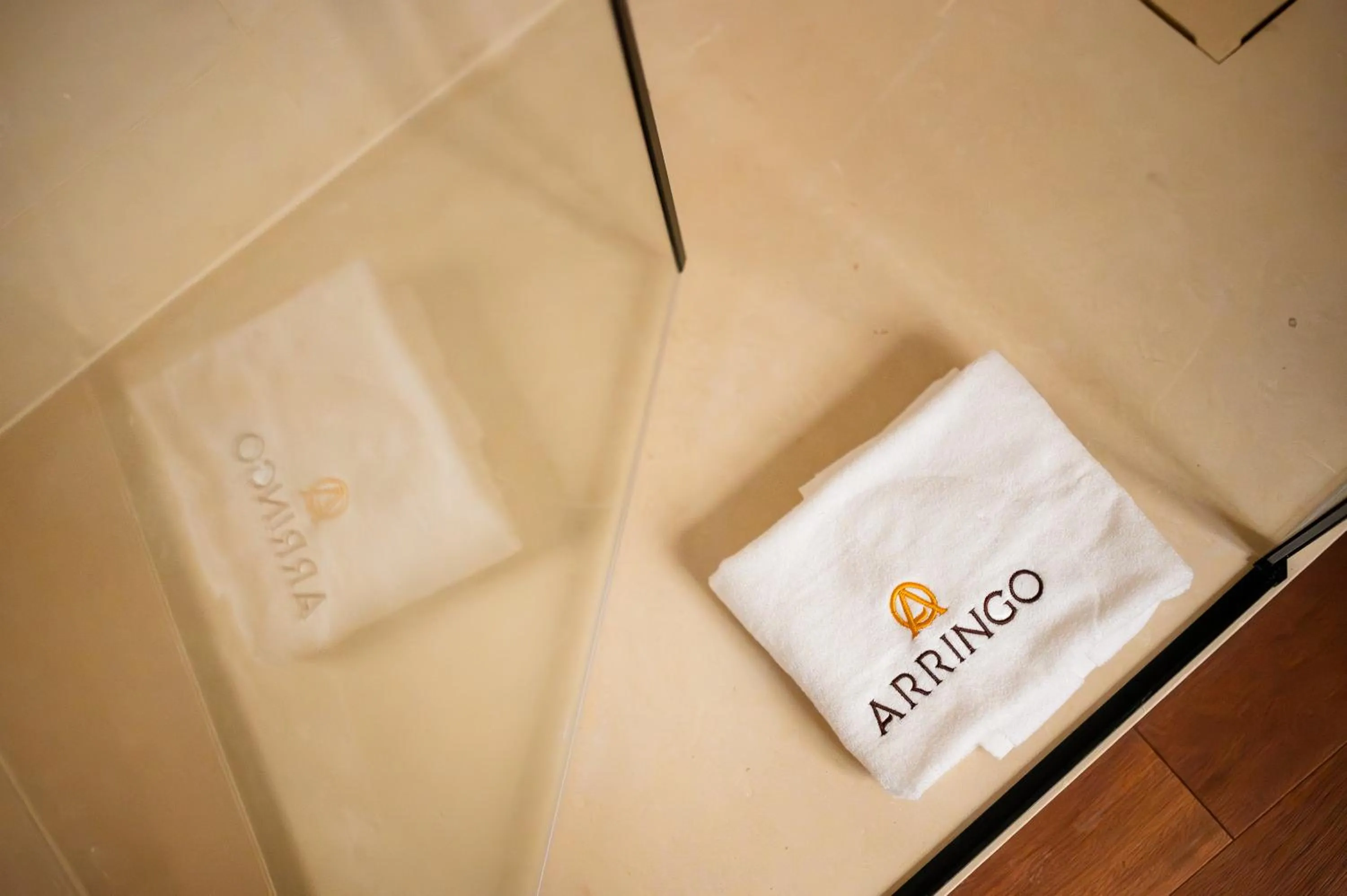 Property logo or sign in Arringo - Stay comfy