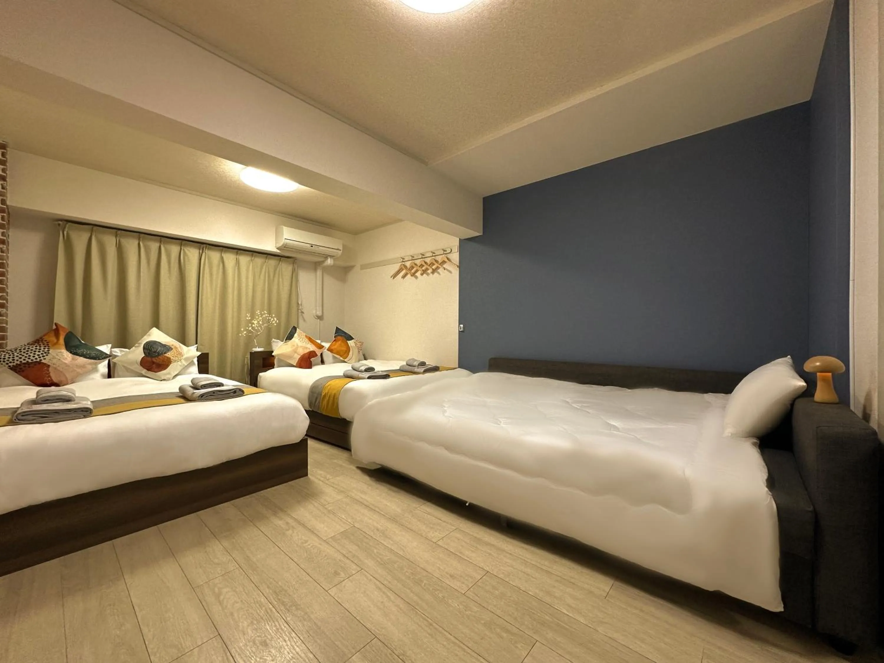 Bed in nestay apartment tokyo otsuka