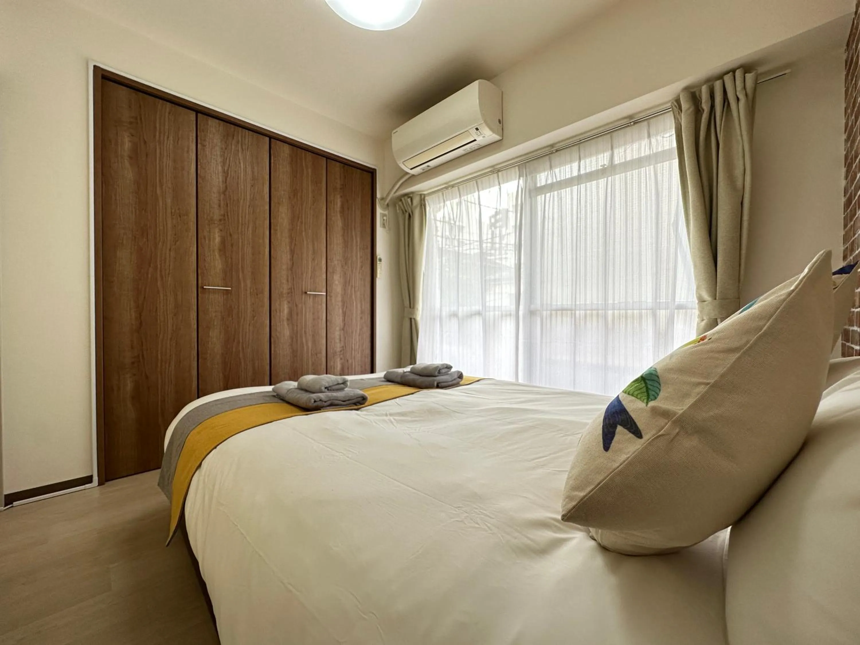 Bed in nestay apartment tokyo otsuka