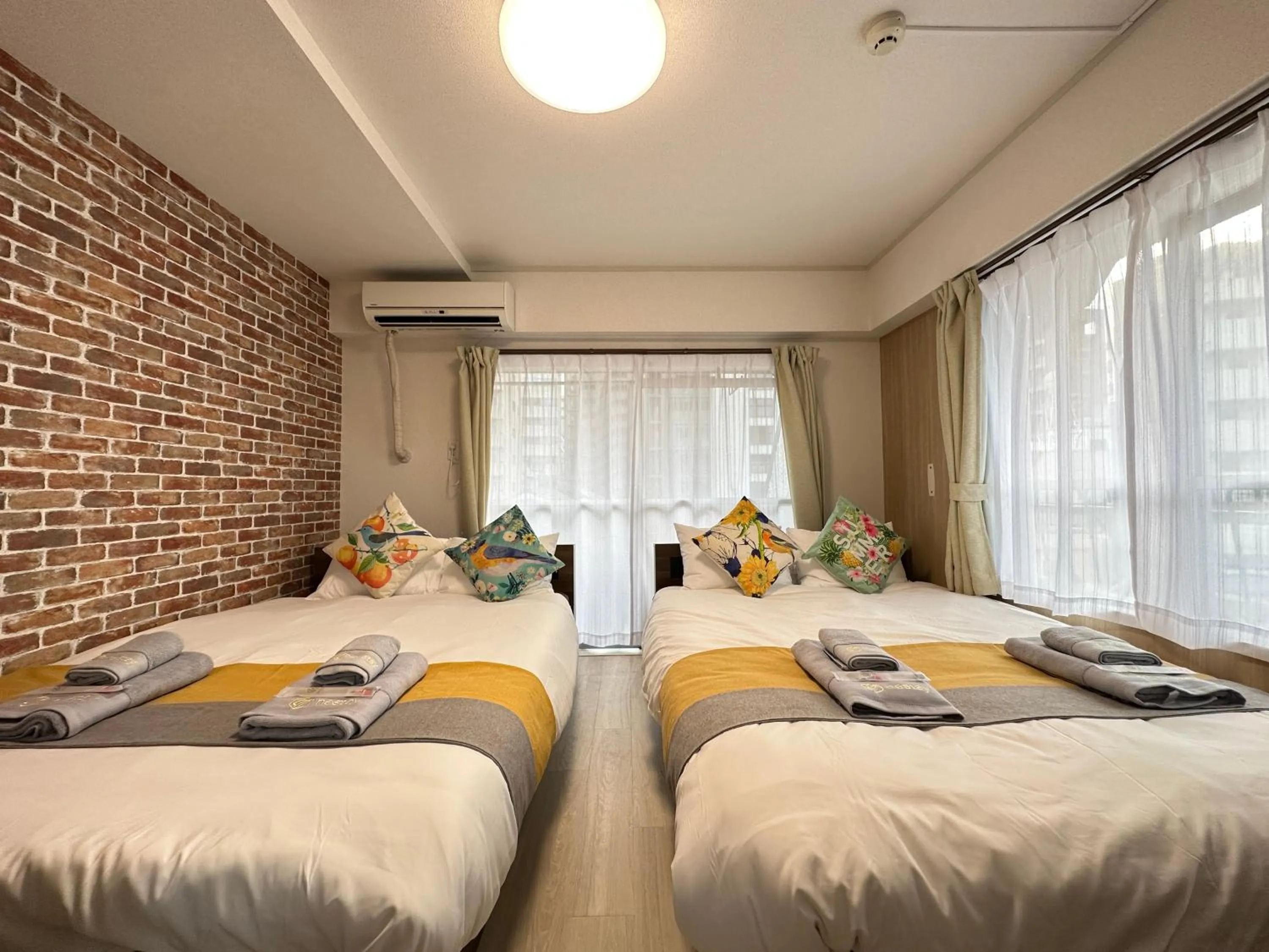 Bed in nestay apartment tokyo otsuka