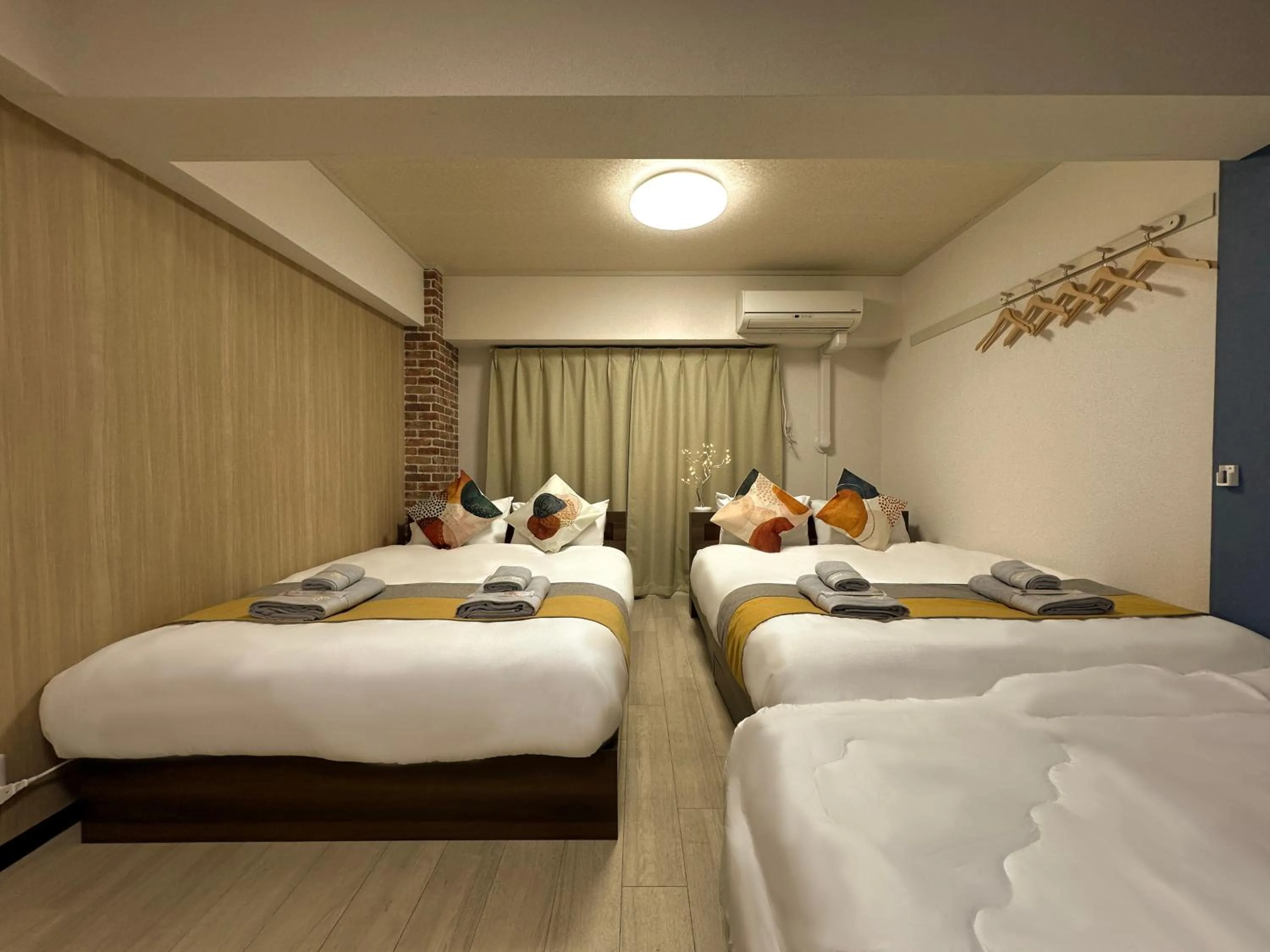 Bed in nestay apartment tokyo otsuka