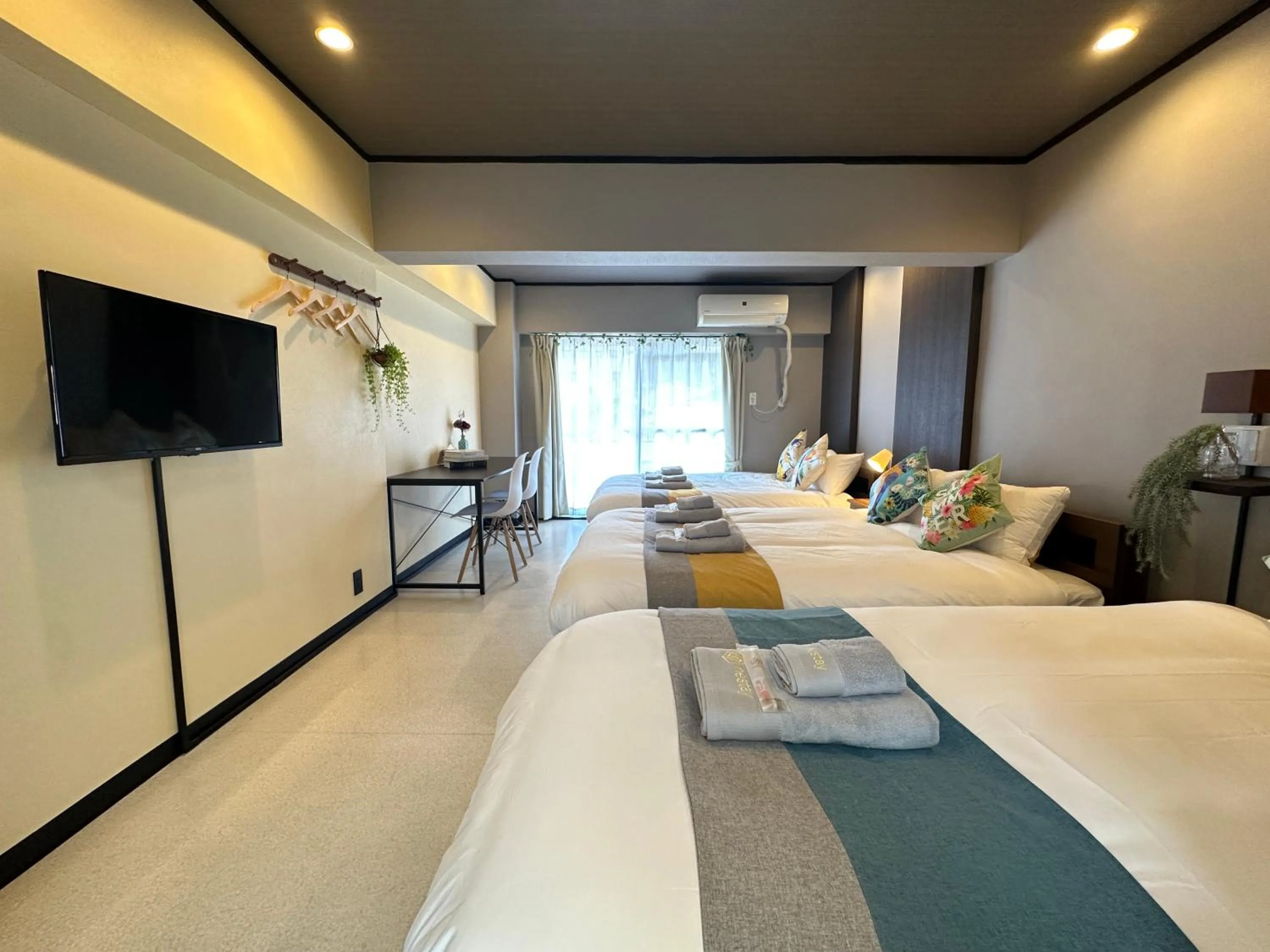 Bed in nestay apartment tokyo otsuka