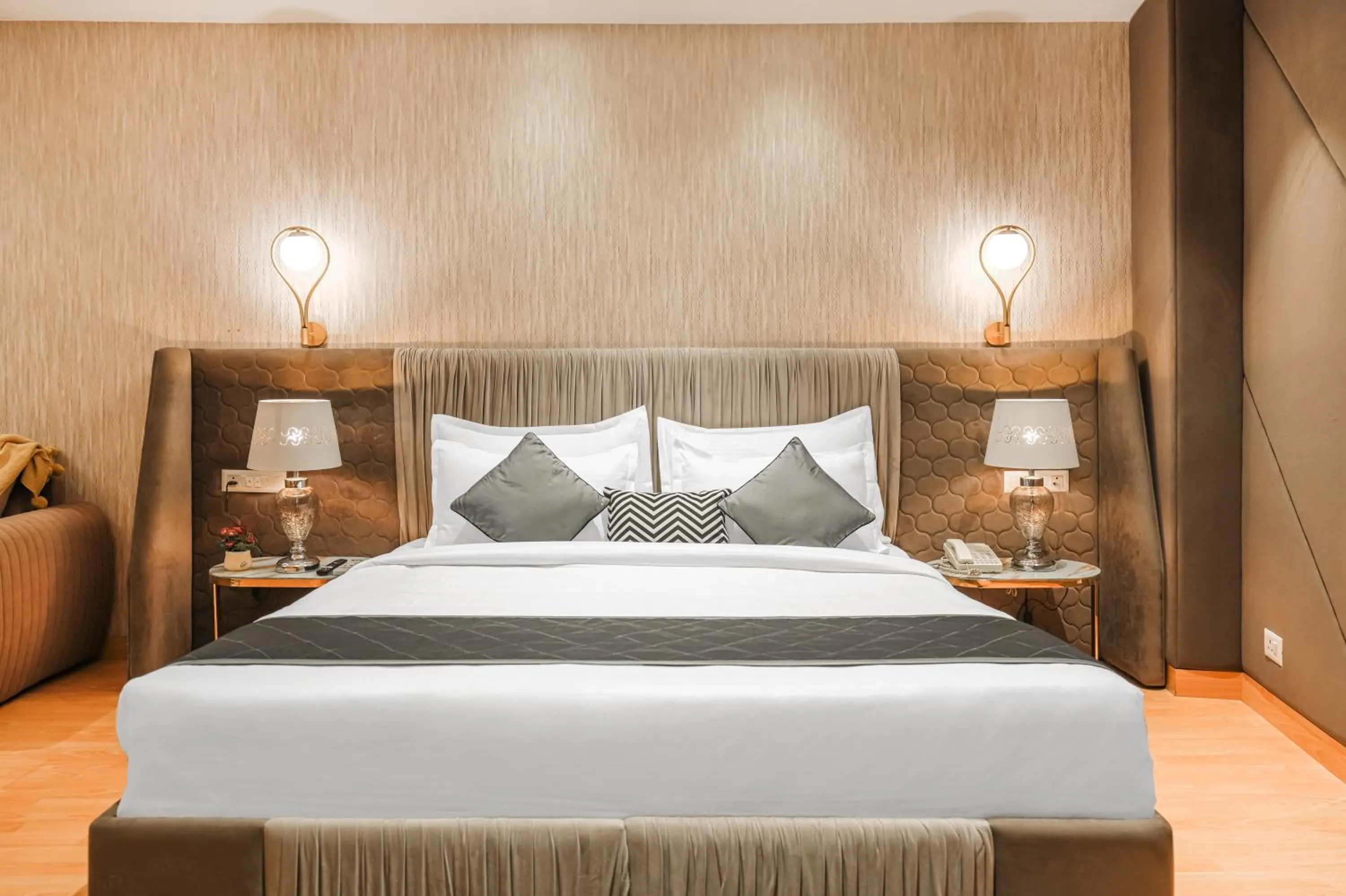 Bed in Quality Inn Elite Levelup Boutique