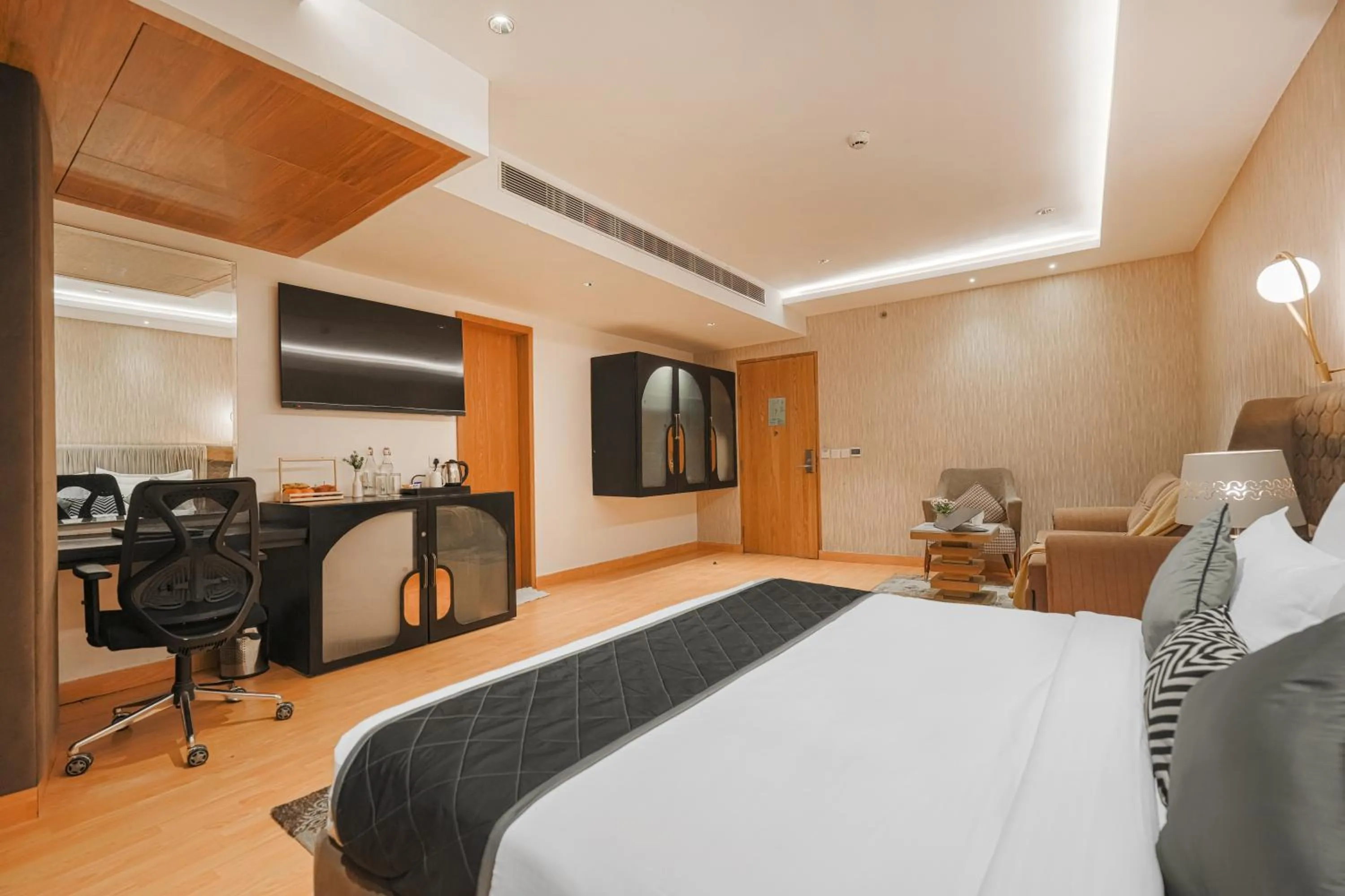 Bed in Quality Inn Elite Levelup Boutique