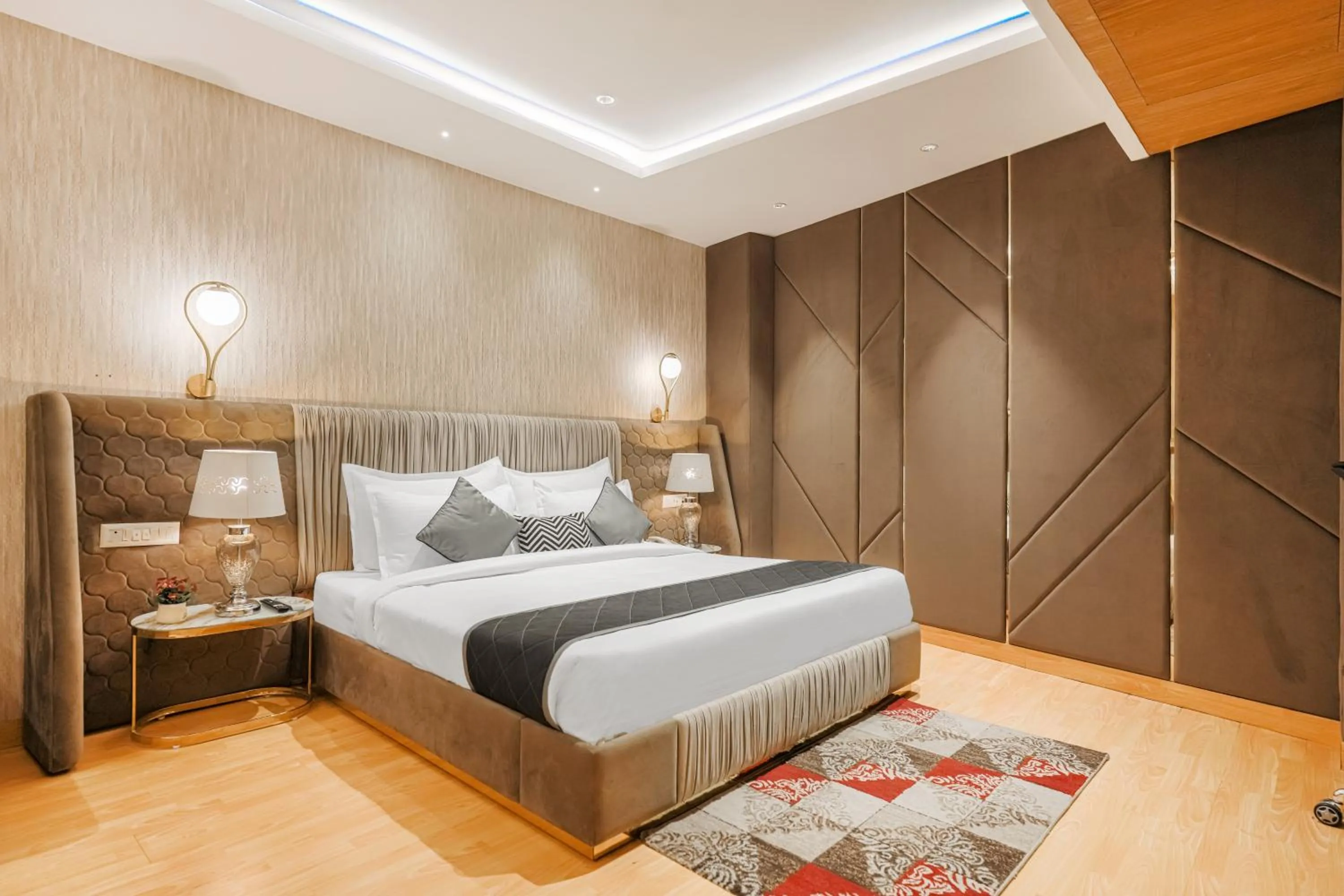 Bed in Quality Inn Elite Levelup Boutique